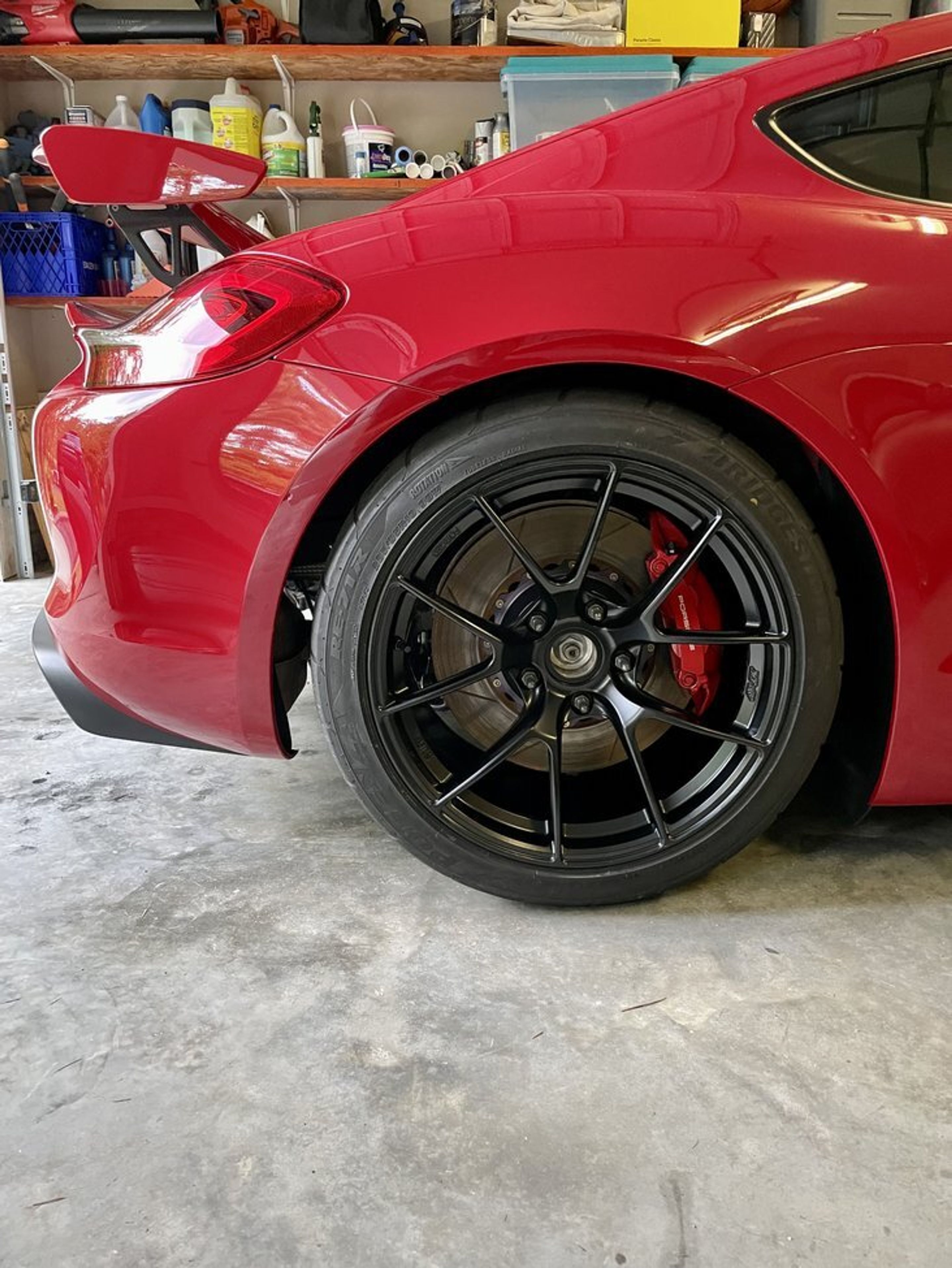 Red Porsche 981 Cayman GT4 with 19" VS-5RS Apex wheels in Satin Black