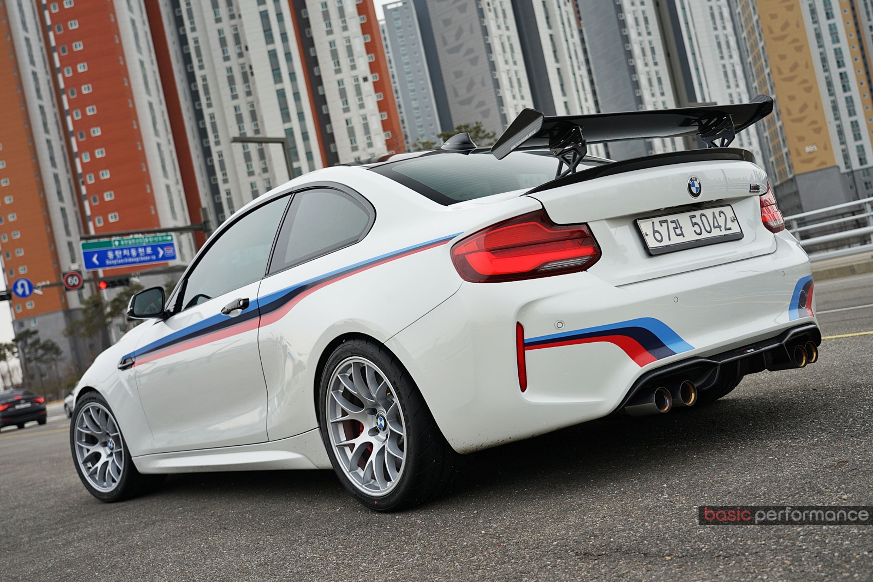 White BMW F87 M2 with 18" EC-7 Apex wheels in Race Silver