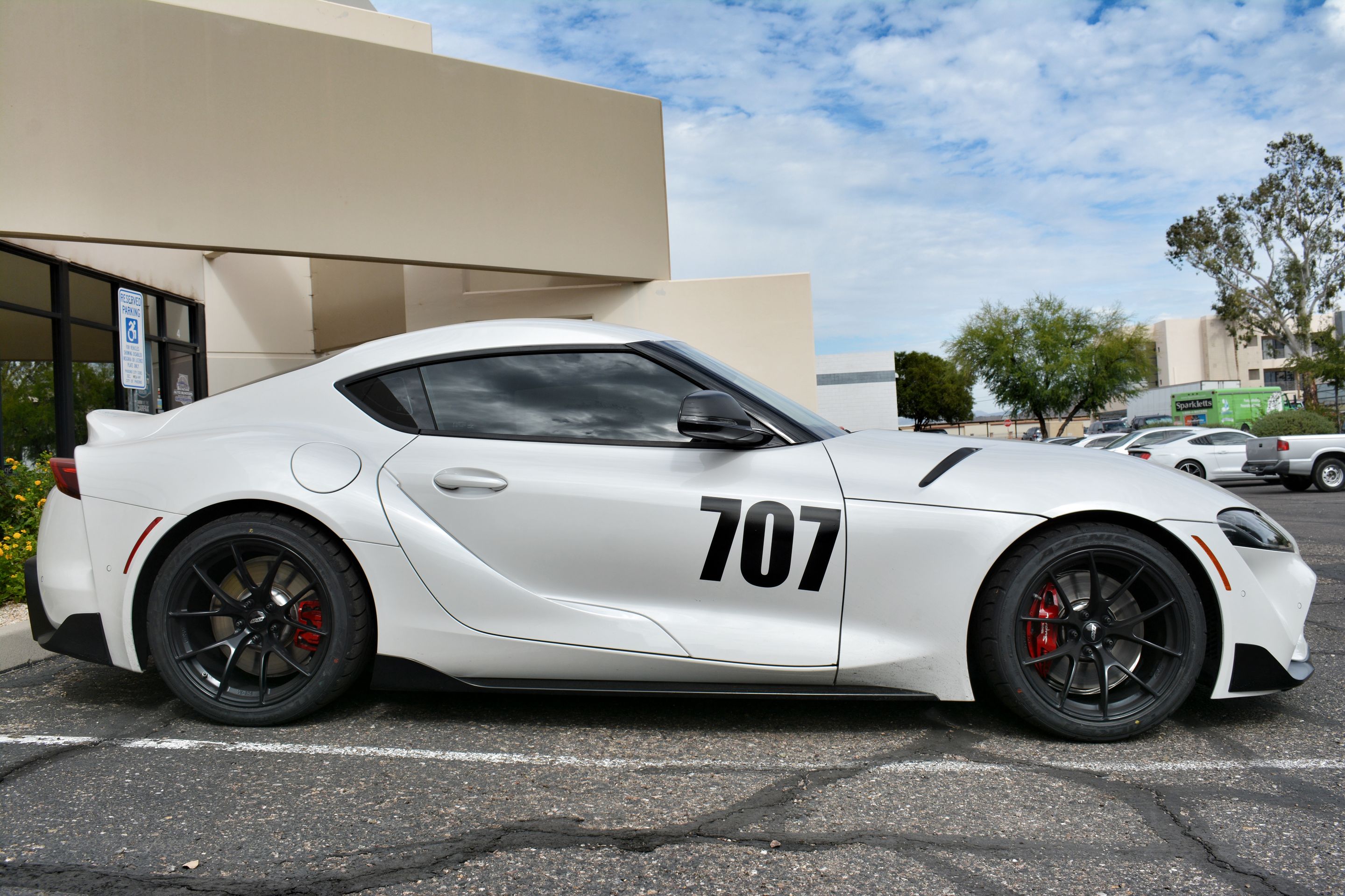 White Toyota GR Supra with 18" VS-5RS Apex wheels in Satin Black