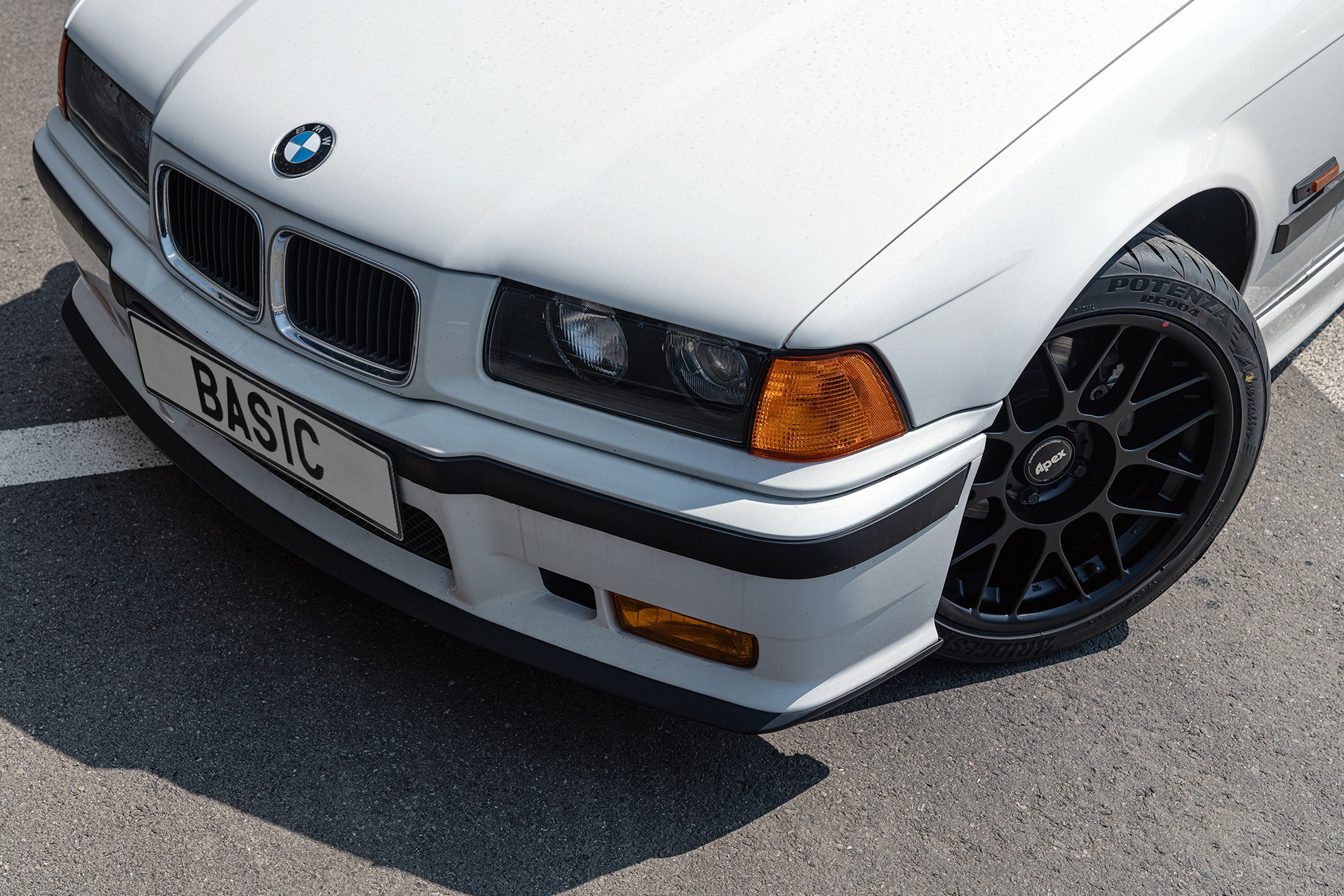 White BMW E36 3 Series with 17" ARC-8 Apex wheels in Satin Black