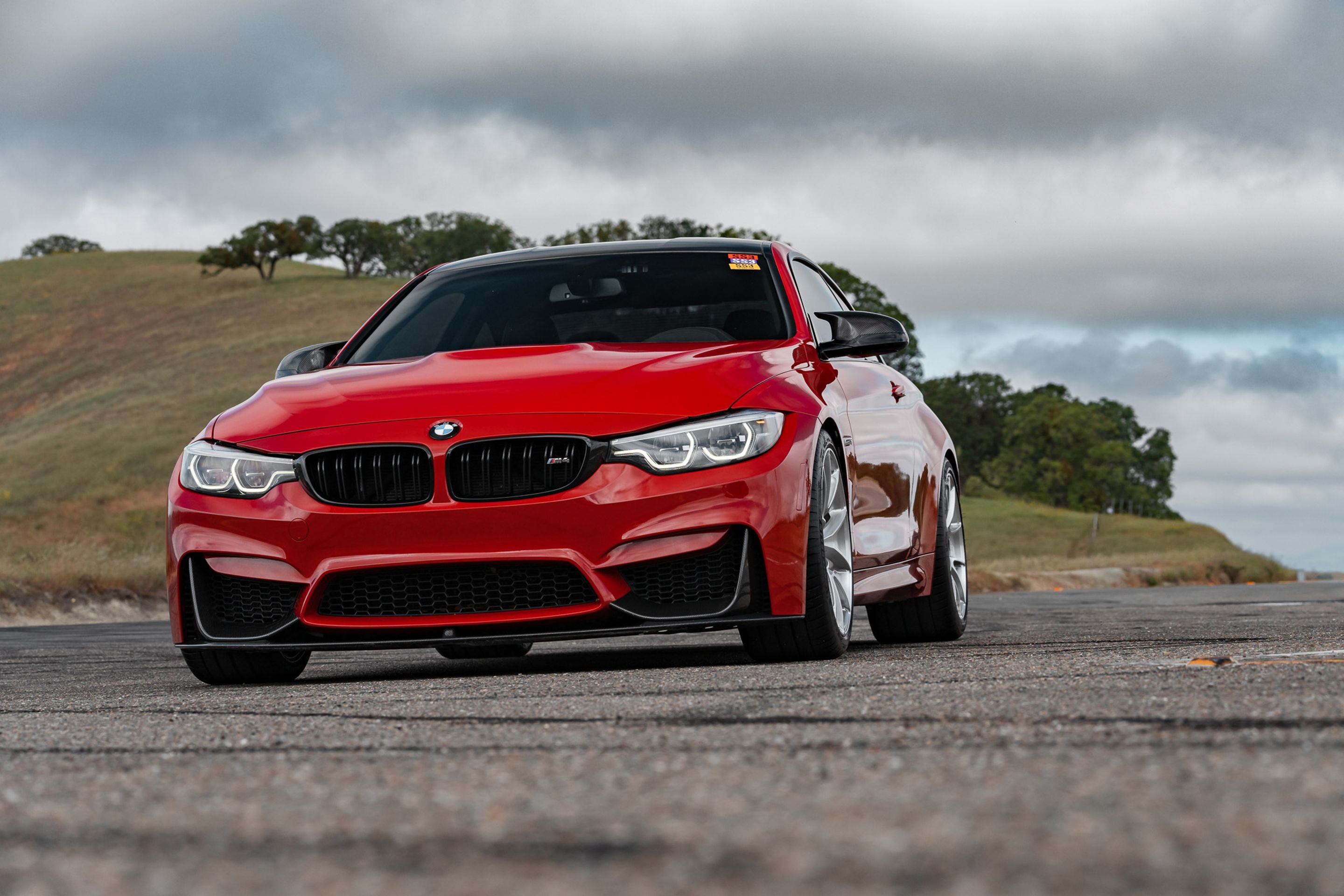 Red BMW F82 Coupe M4 with 19" VS-5RS Apex wheels in Brushed Clear