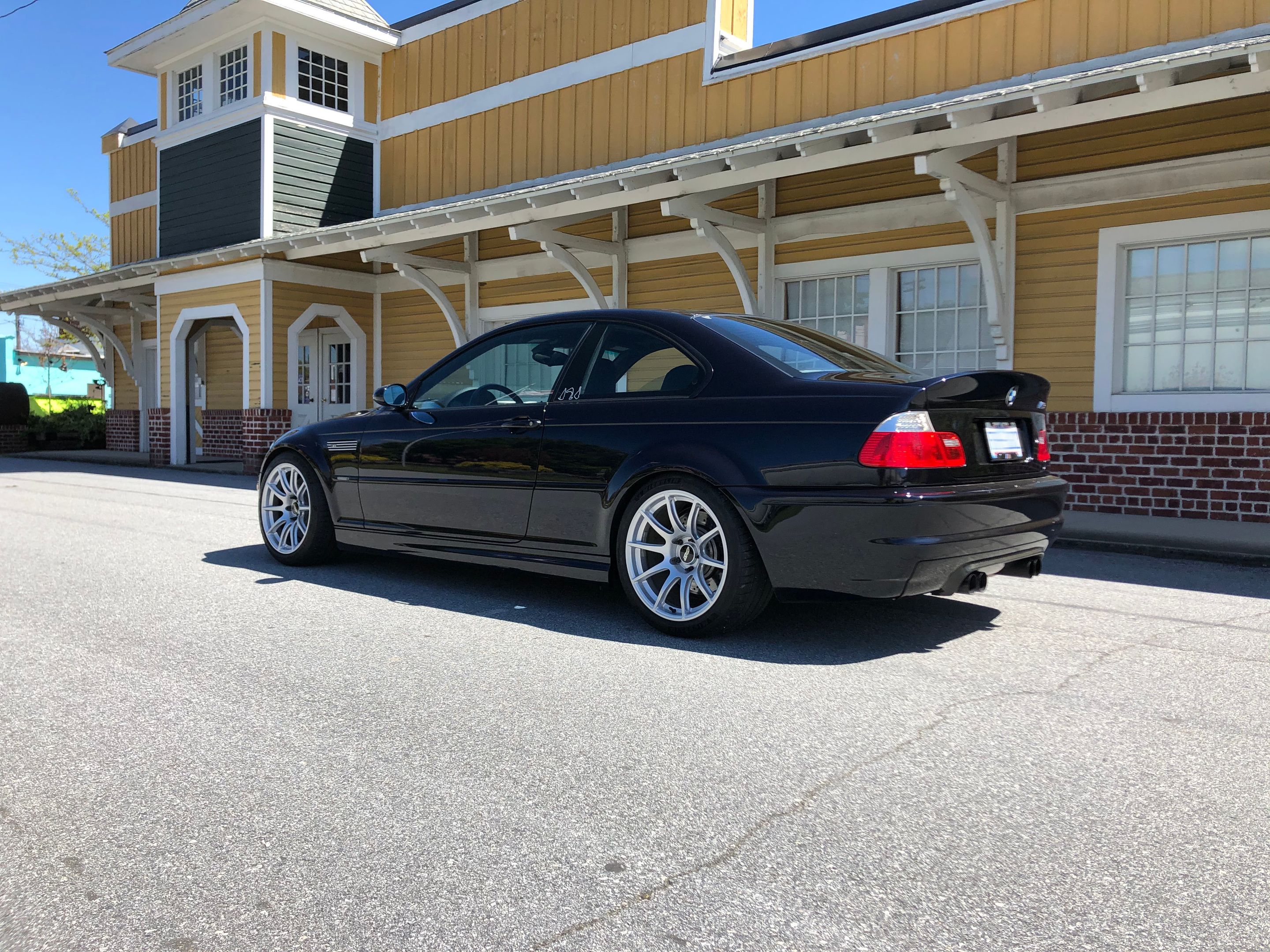 Black BMW E46 M3 with 18" SM-10 Apex wheels in Race Silver
