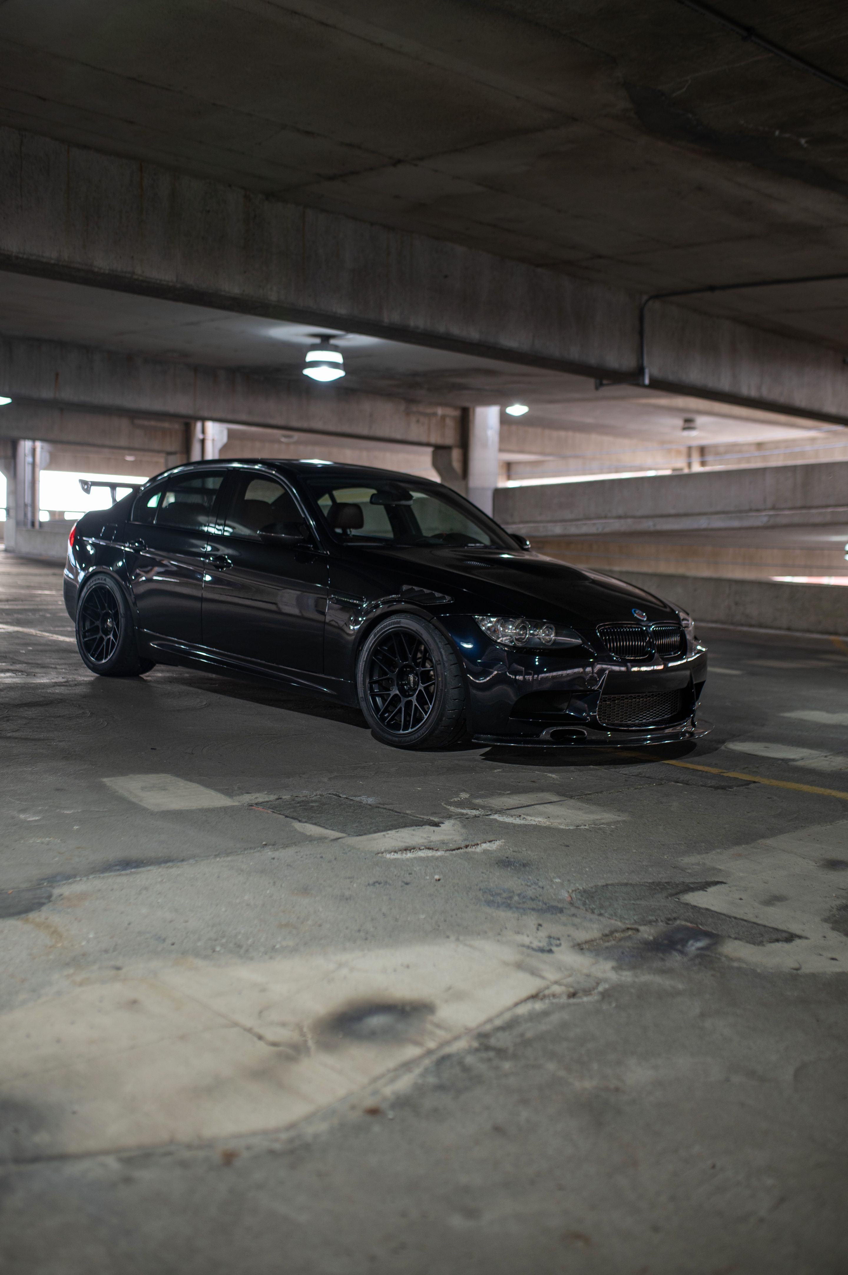 Black BMW E90 Sedan M3 with 18" ARC-8 Apex wheels in Satin Black