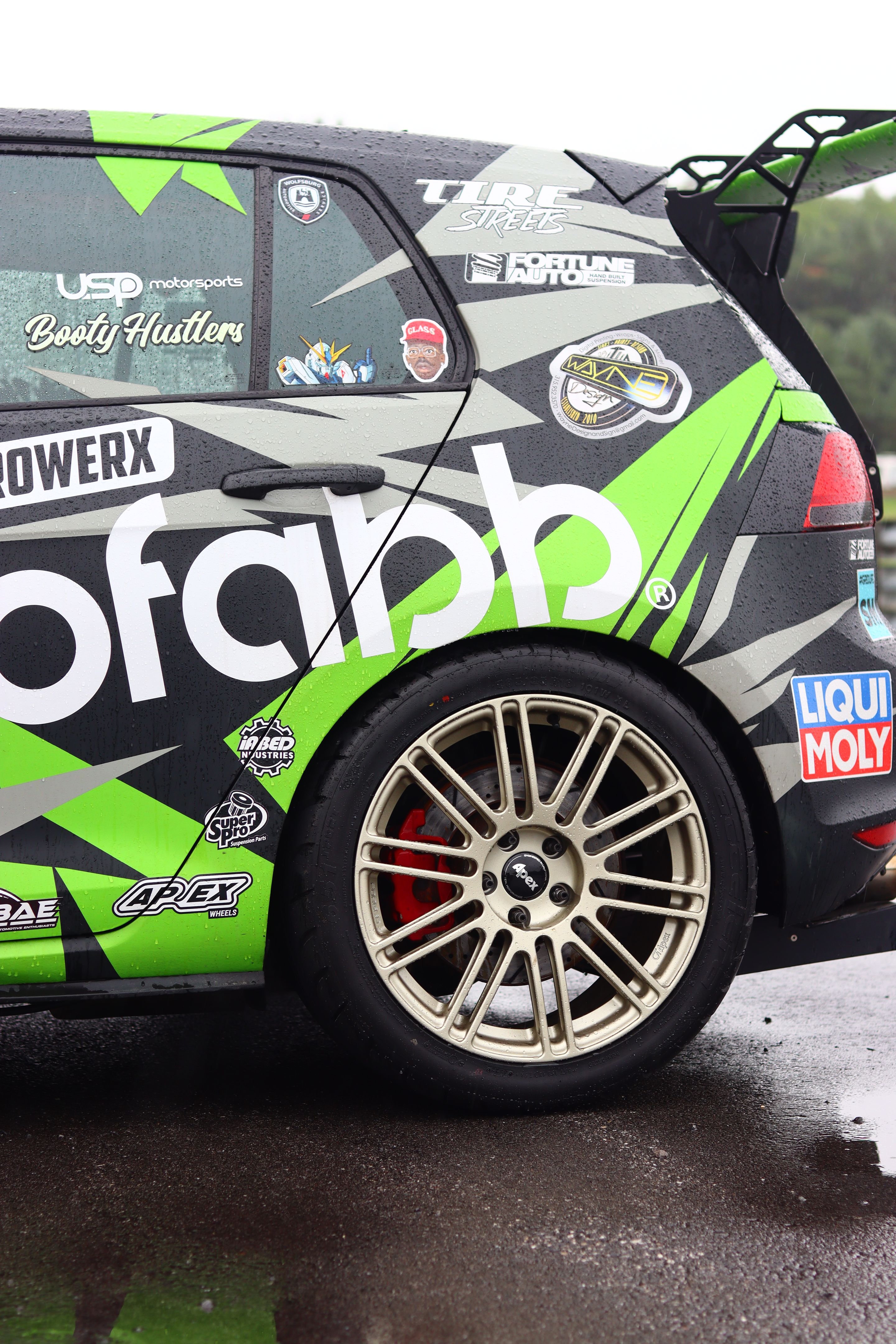 Race Livery VW MK7 GTI with 18" TC-10RT Apex wheels in Motorsport Gold