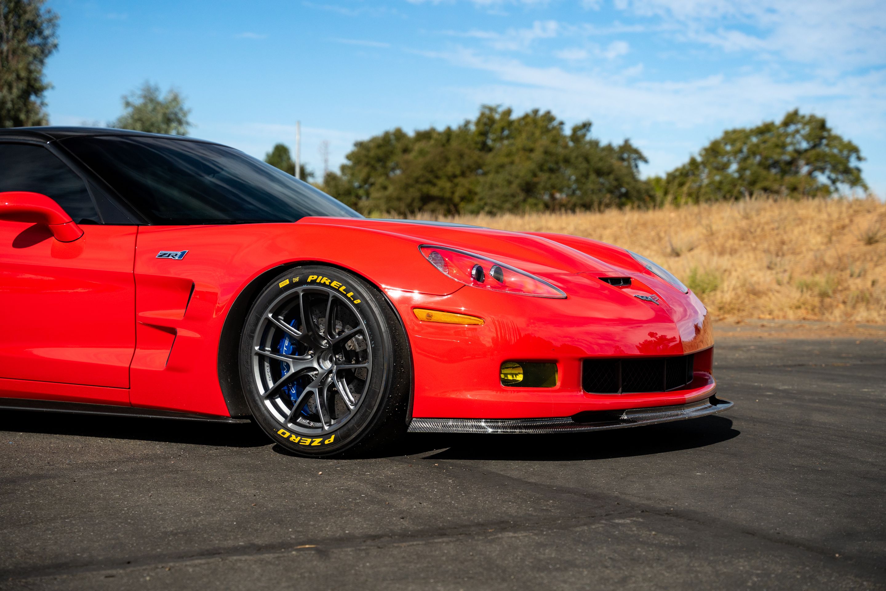 Red Chevrolet C6 Corvette ZR-1 with 18" VS-5RE Apex wheels in Anthracite