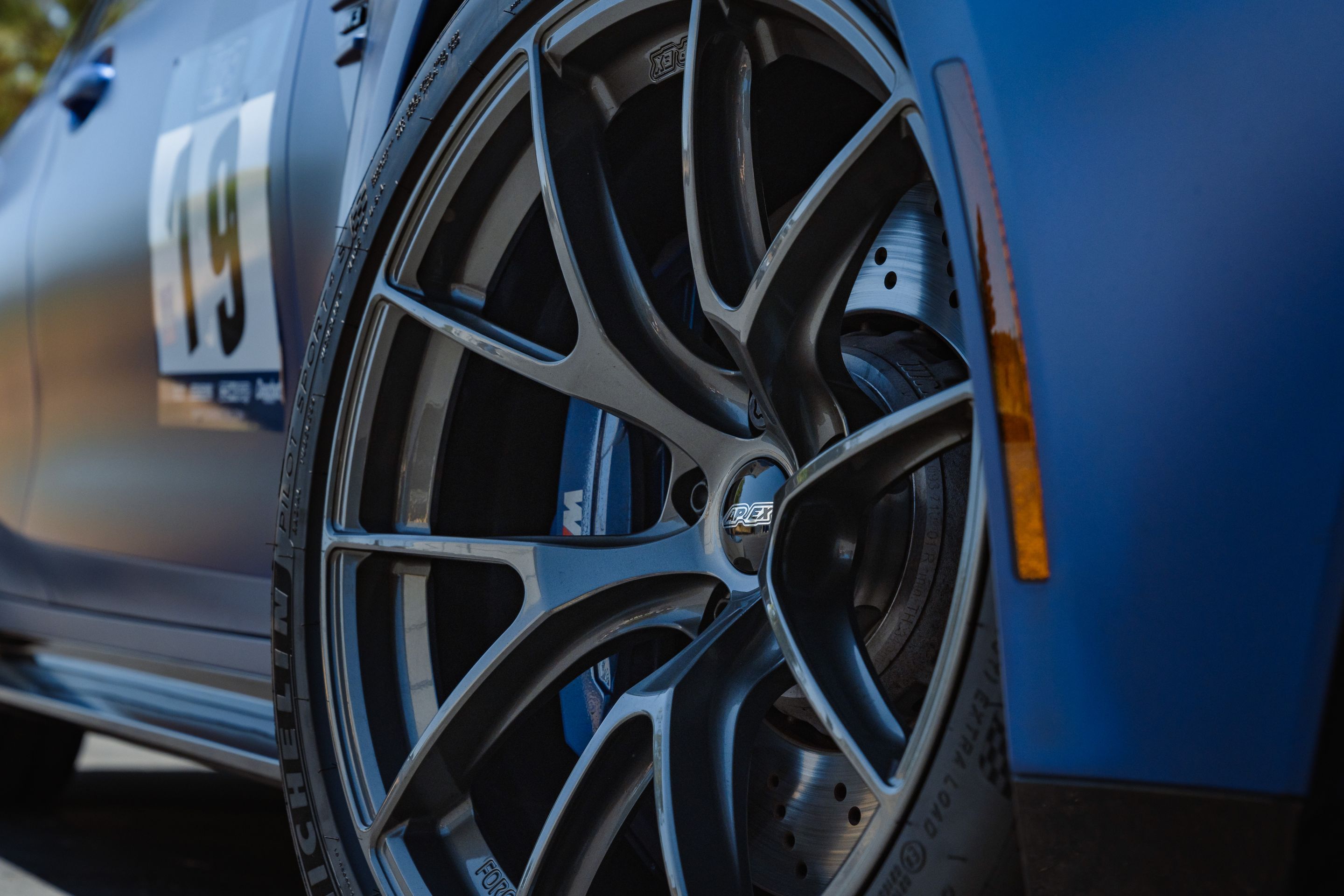 Blue BMW G80 M3 with 19"/20" VS-5RS Apex wheels in Anthracite