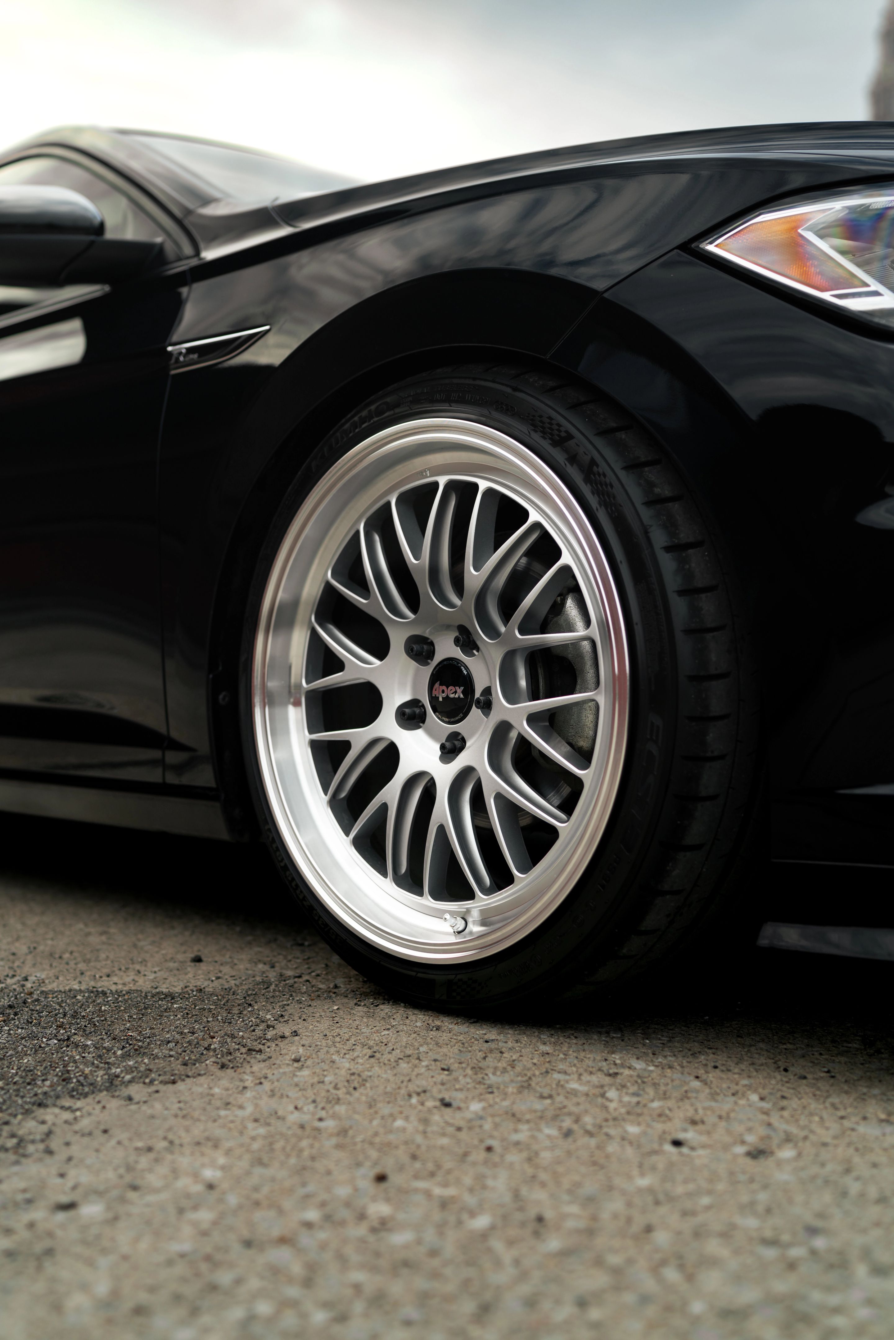 Black VW MK7 Jetta with 19" ML-10RT Apex wheels in Machined Lip Race Silver