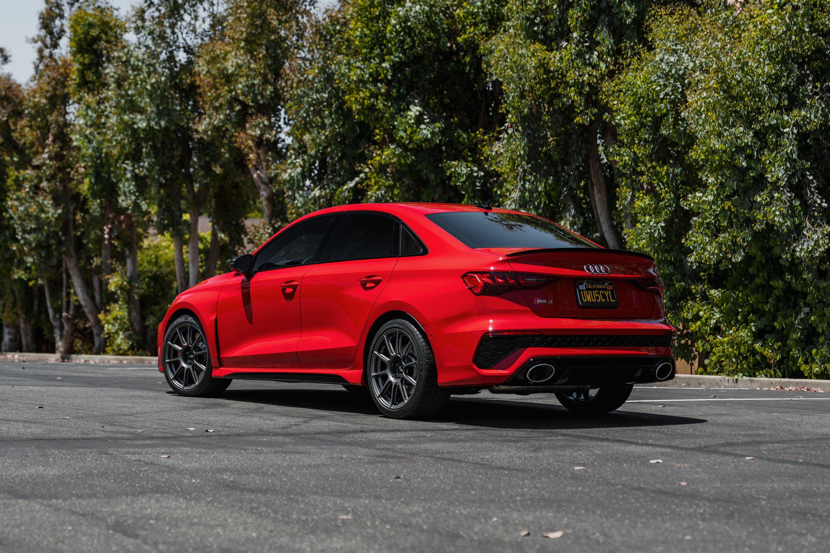 Red Audi 8Y RS 3 with 18" SM-10 Apex wheels in Anthracite