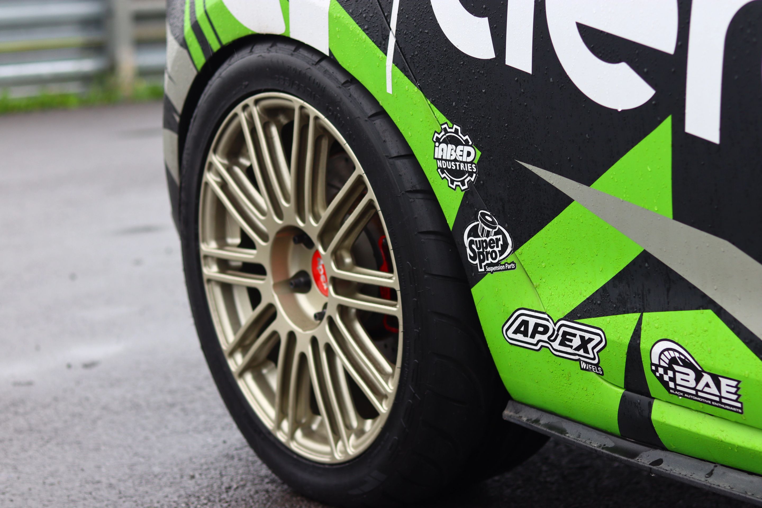 Race Livery VW MK7 GTI with 18" TC-10RT Apex wheels in Motorsport Gold