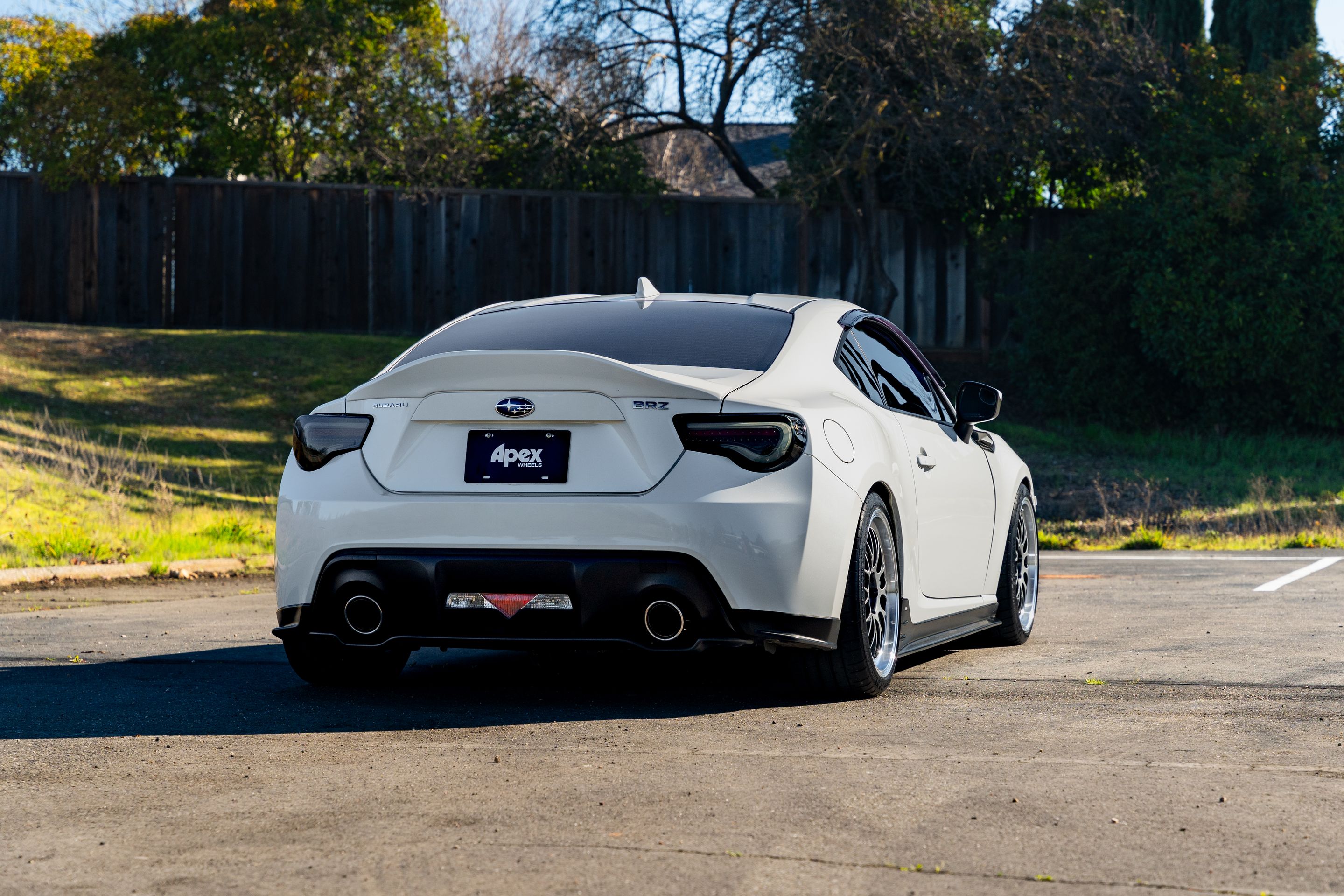 White Subaru ZC6 / Gen 1 BRZ with 18" ML-10RT Apex wheels in Machined Lip Anthracite