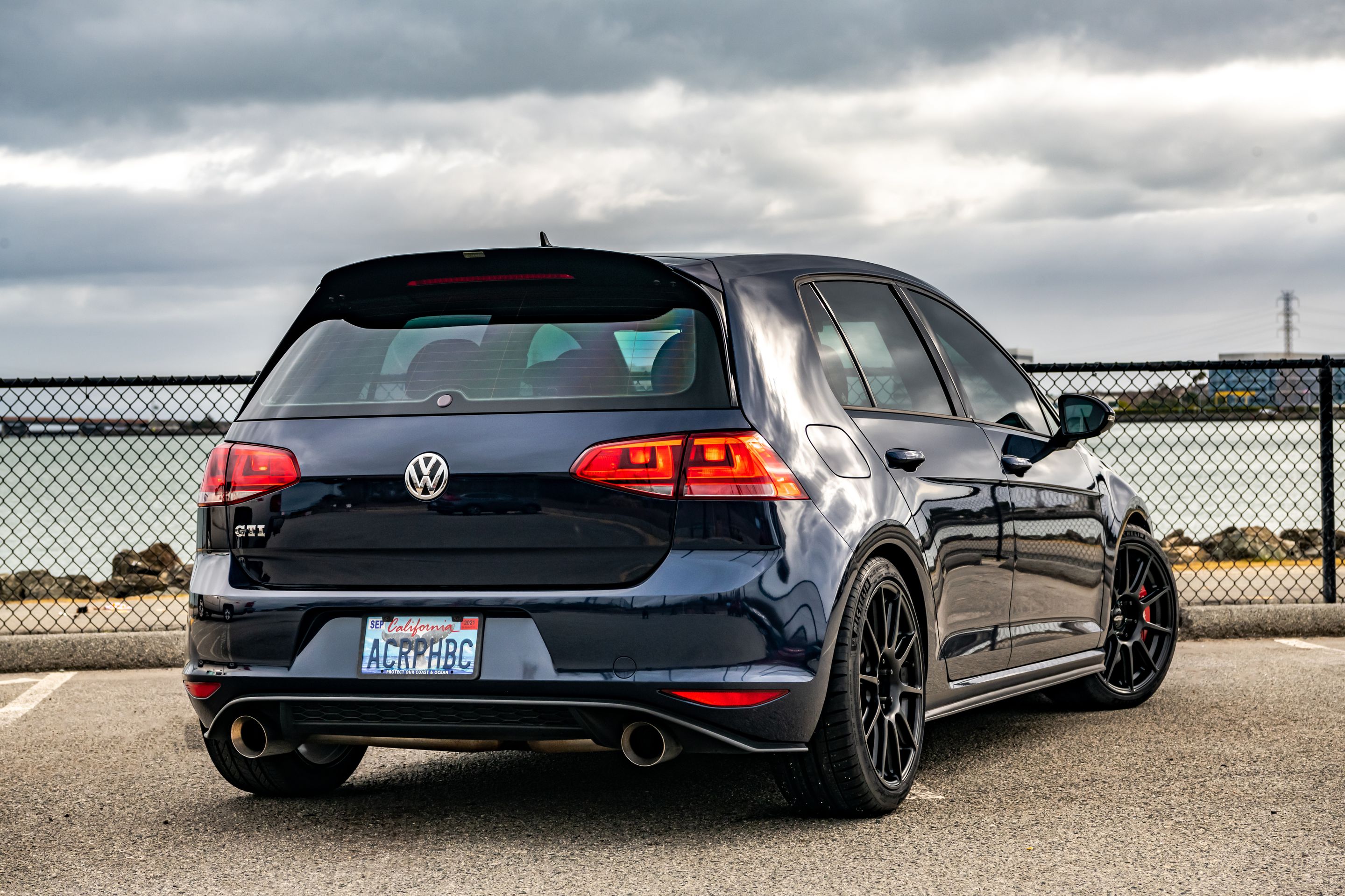 Blue VW MK7 GTI with 18" SM-10 Apex wheels in Satin Black