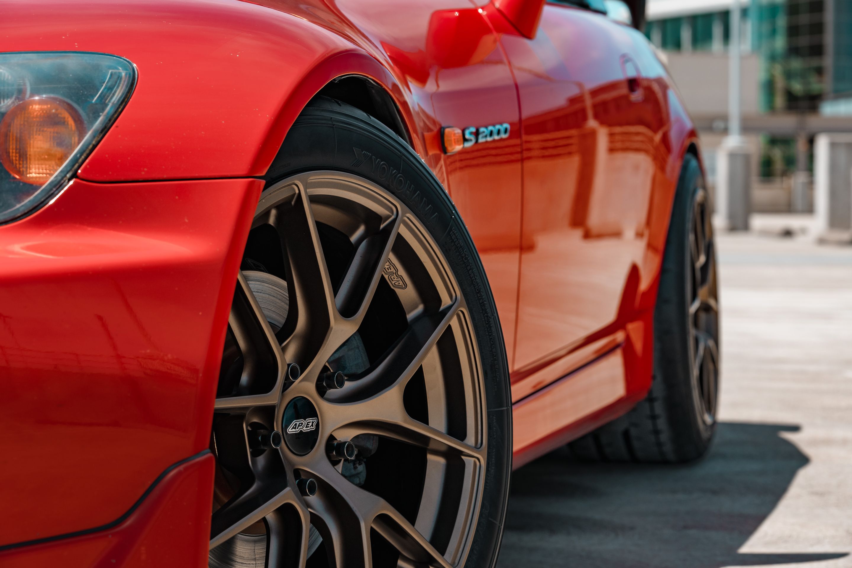 Red Honda S2000 with 17" VS-5RS Apex wheels in Satin Bronze