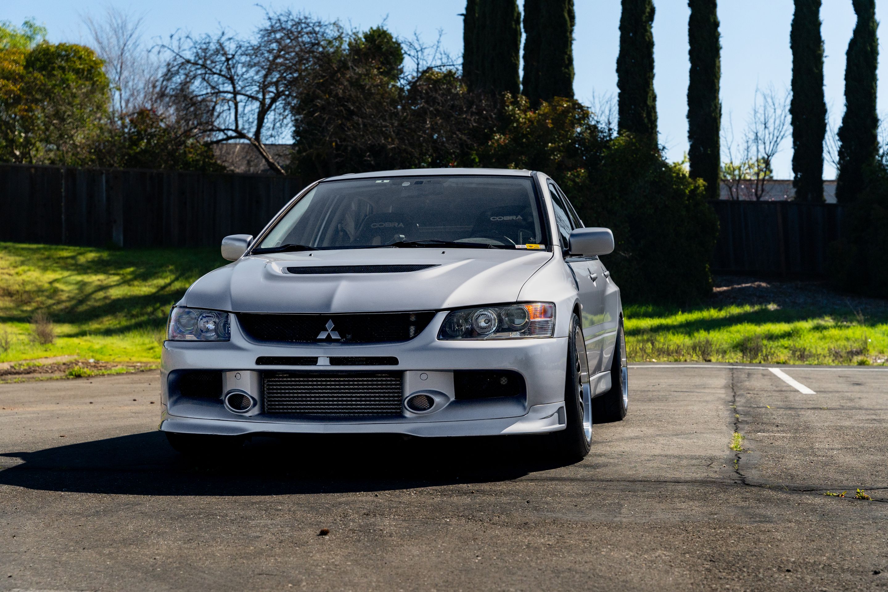 Silver Mitsubishi Lancer Evolution IX with 18" ML-10RT Apex wheels in Machined Lip Anthracite