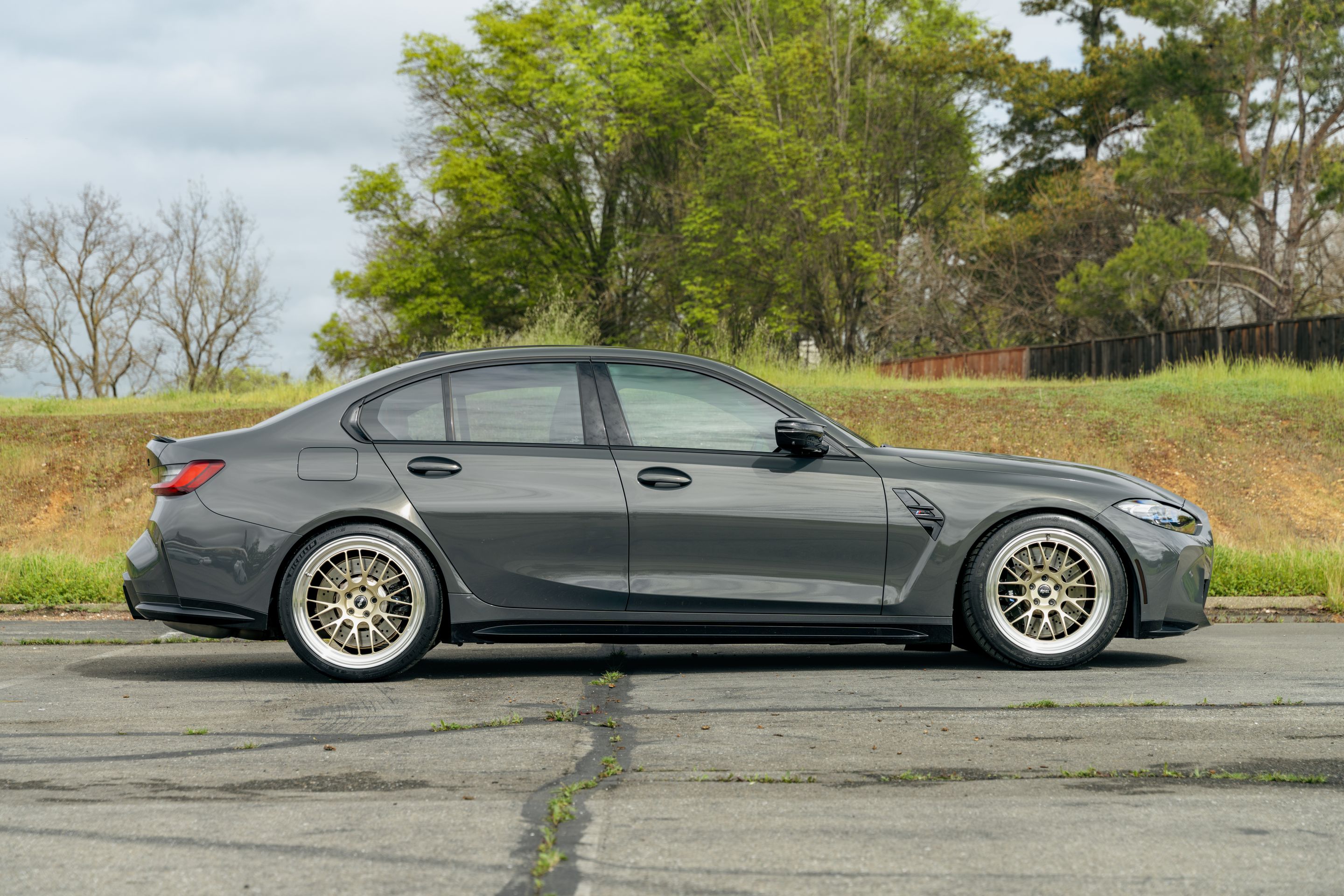 Grey BMW G80 M3 with 19"/20" ML-10RT Apex wheels in Machined Lip Gloss Motorsport Gold