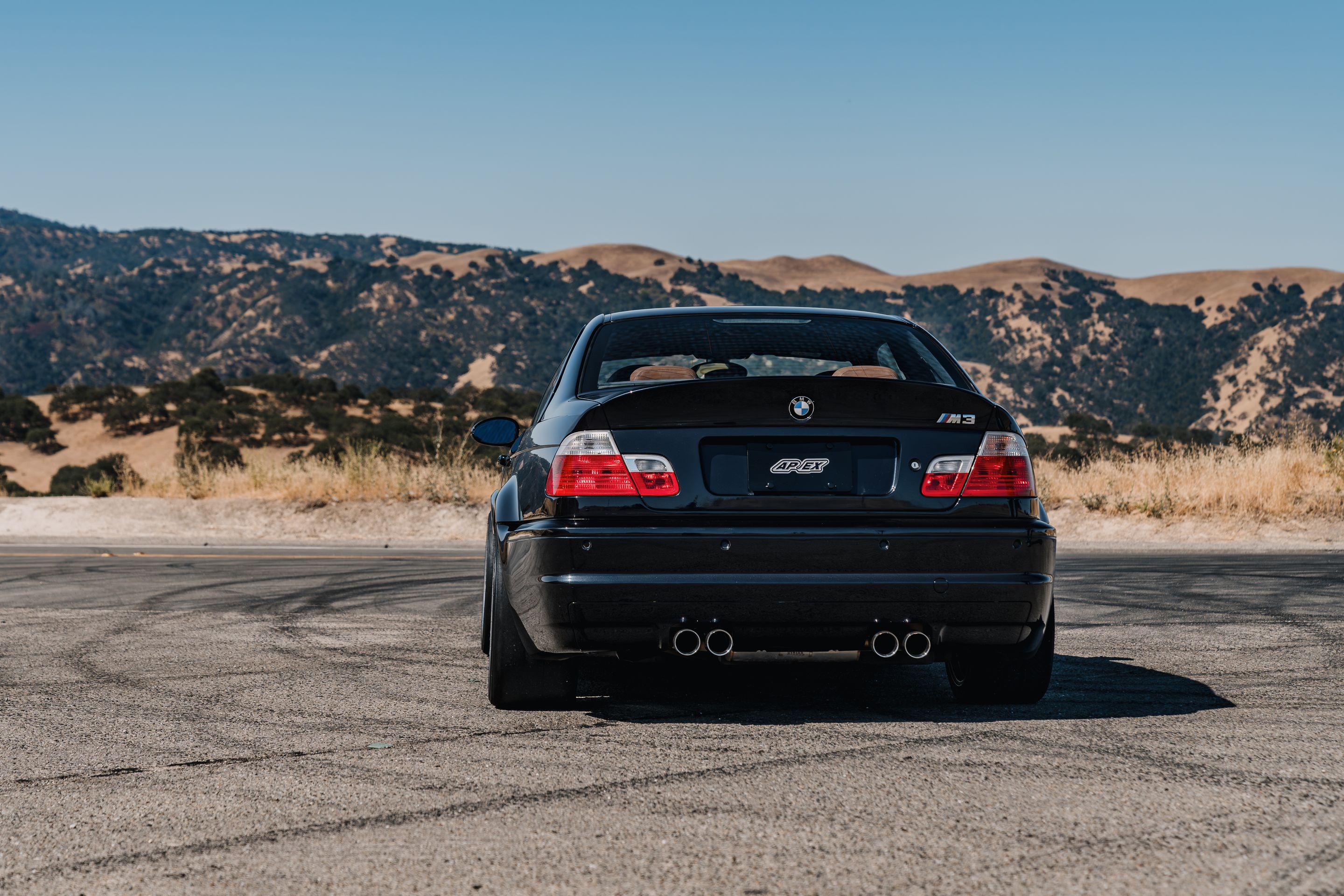 Black BMW E46 M3 with 18" ARC-8RT Apex wheels in Race Silver