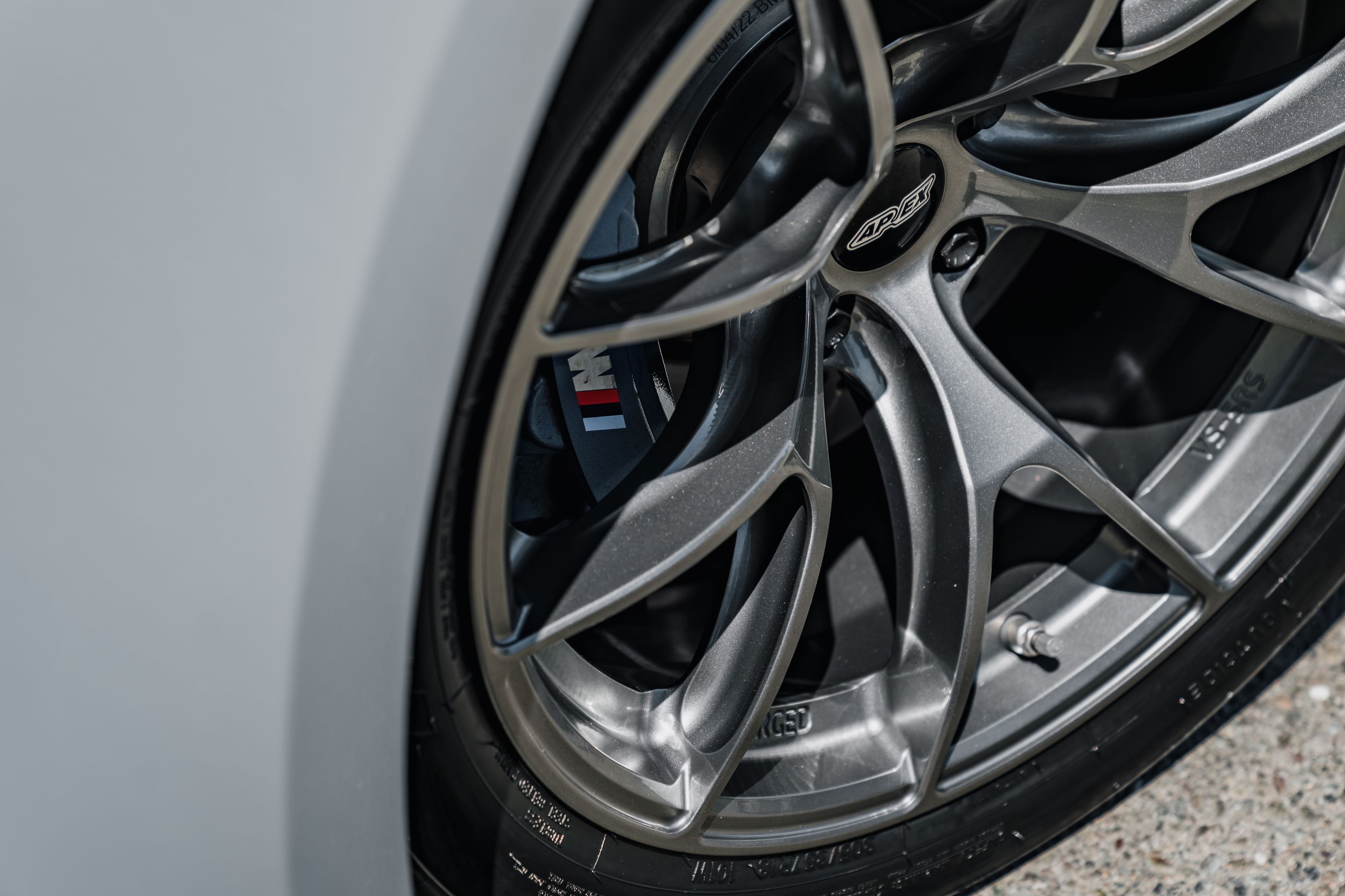 Grey BMW G87 M2 with 18" VS-5RS Apex wheels in Anthracite