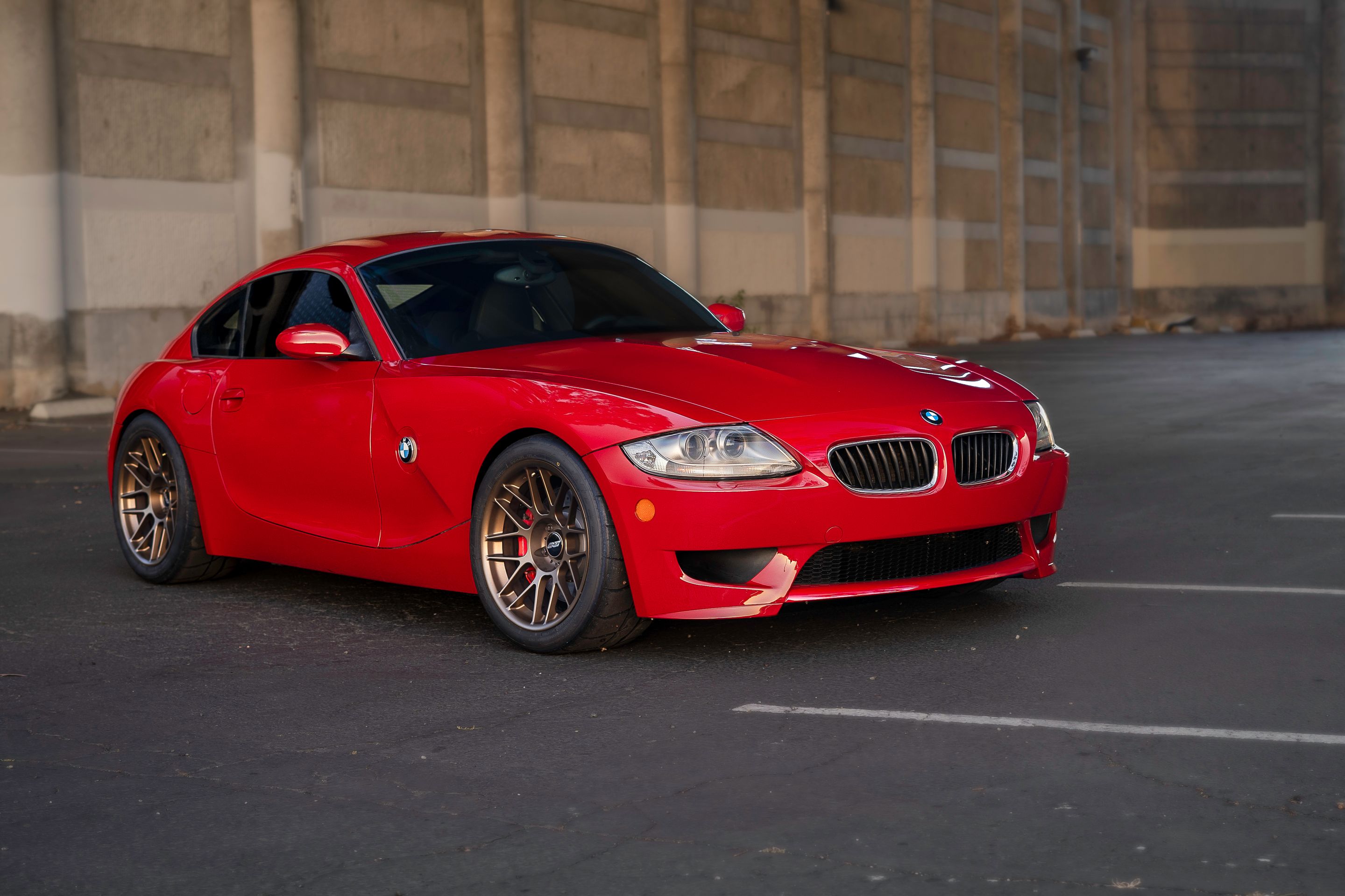 Red BMW E86 Coupe Z4 M with 18" ARC-8 Apex wheels in Satin Bronze