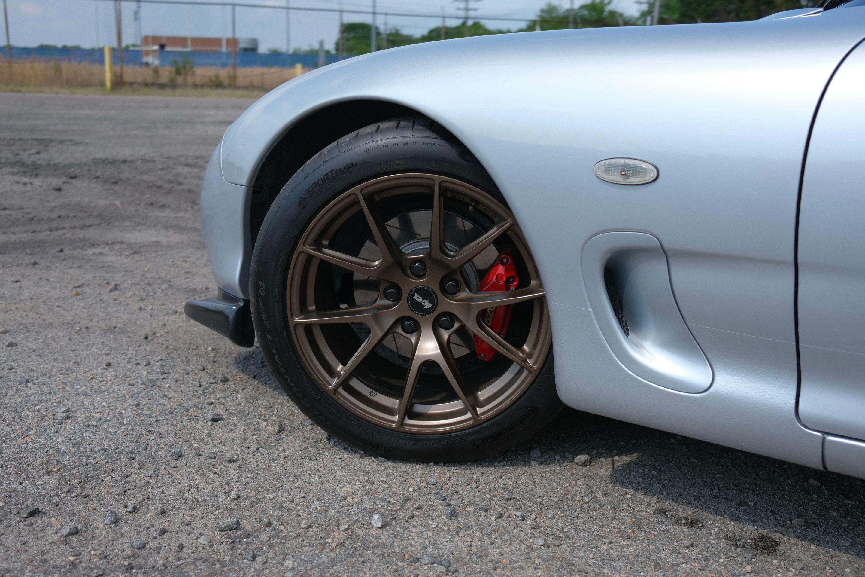 Silver Mazda FD RX-7 with 17" VS-5 Apex wheels in Satin Bronze