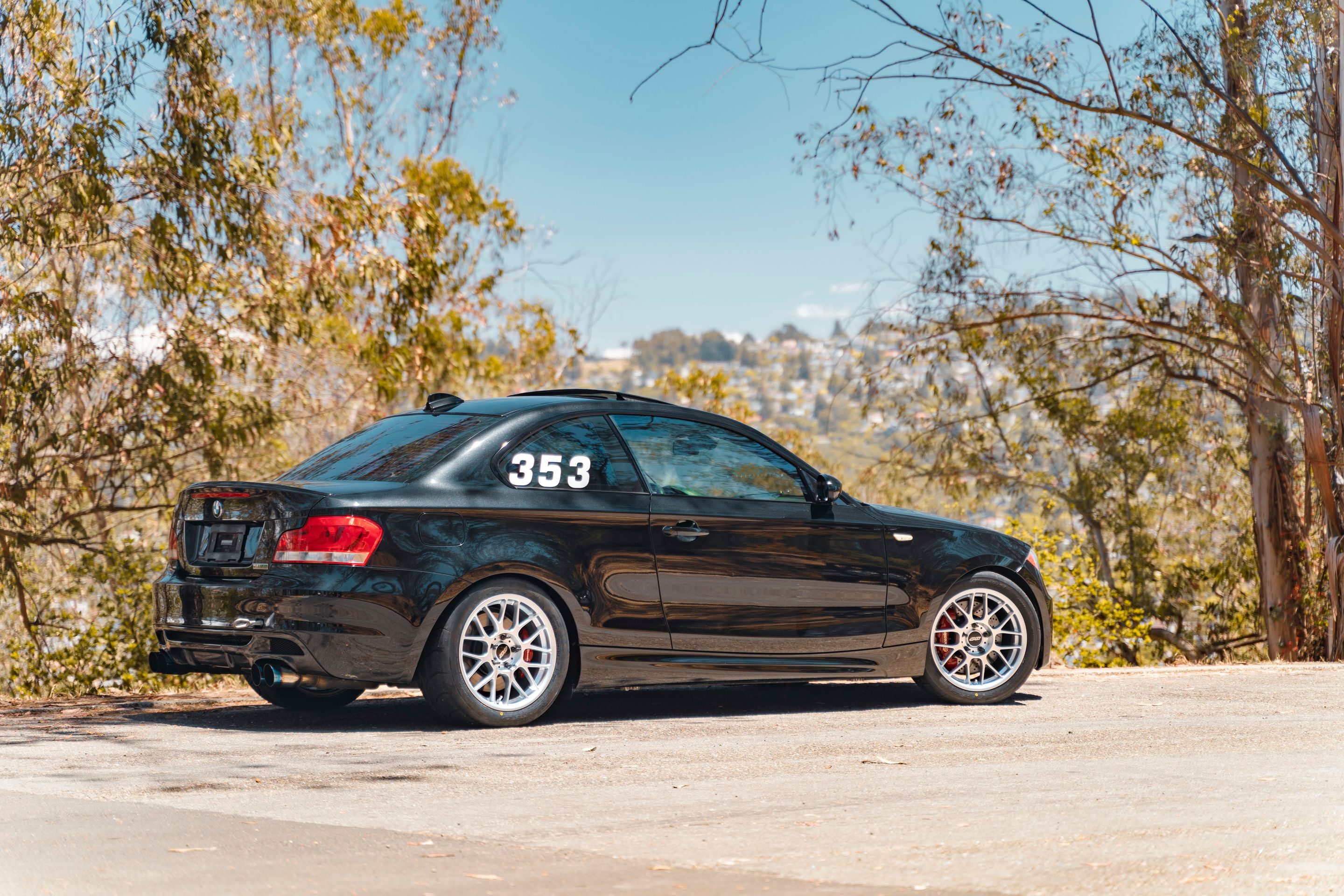 Black BMW E82 Coupe 1 Series with 17" ARC-8 Apex wheels in Race Silver