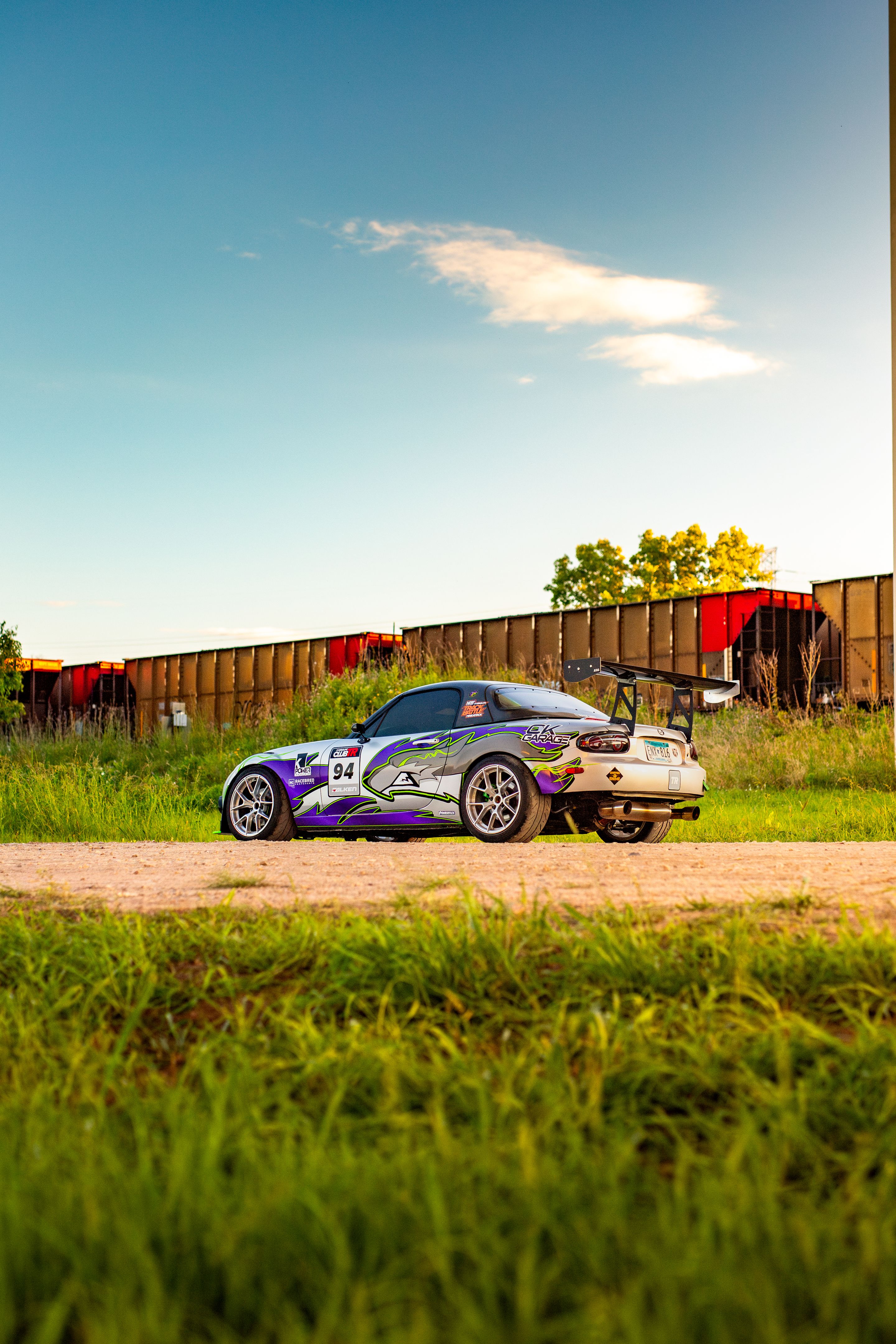 Silver Mazda NC MX-5 Miata with 17" VS-5RS Apex wheels in Brushed Clear