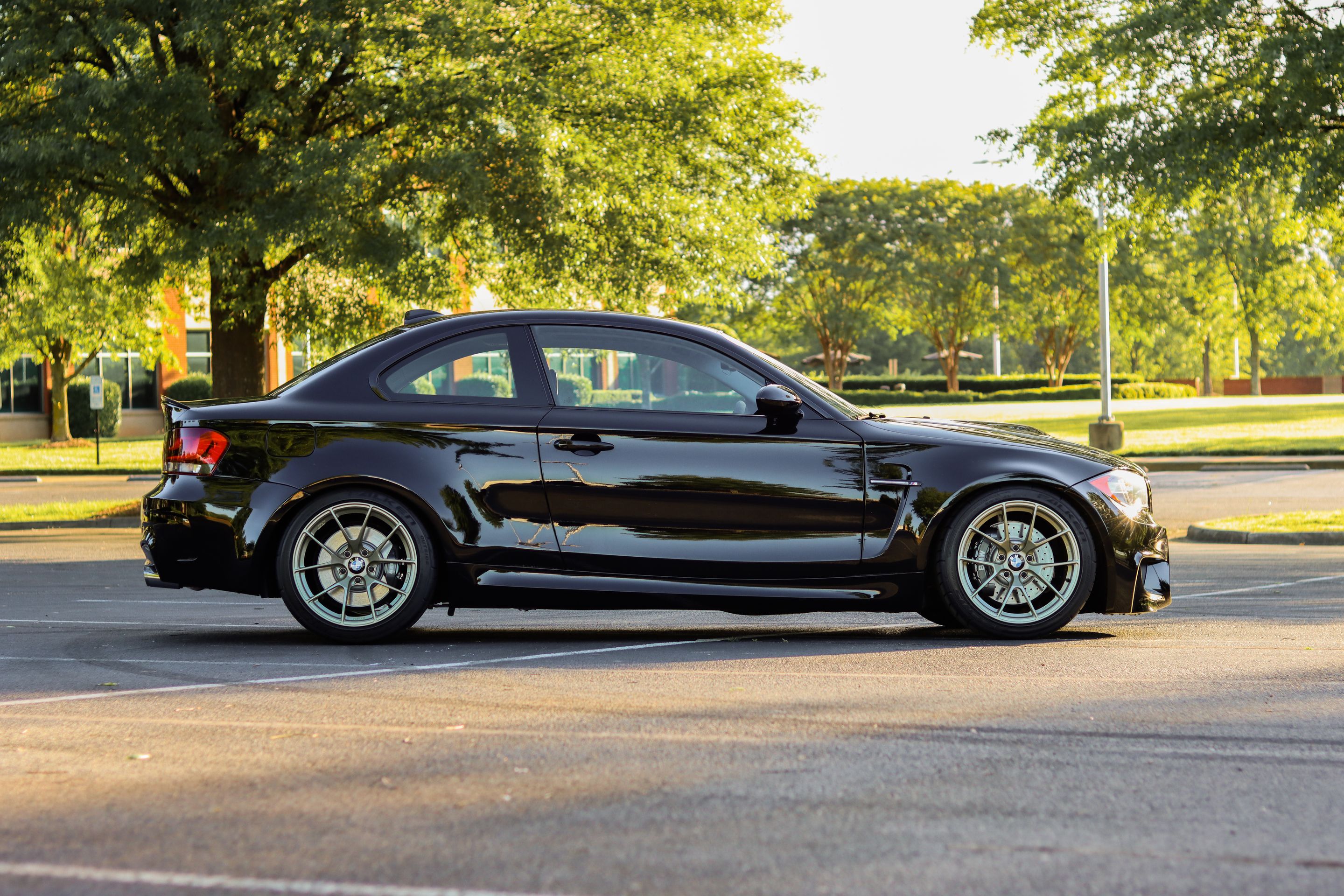 Black BMW E82 Coupe 1 Series with 18" VS-5RS Apex wheels in Motorsport Gold