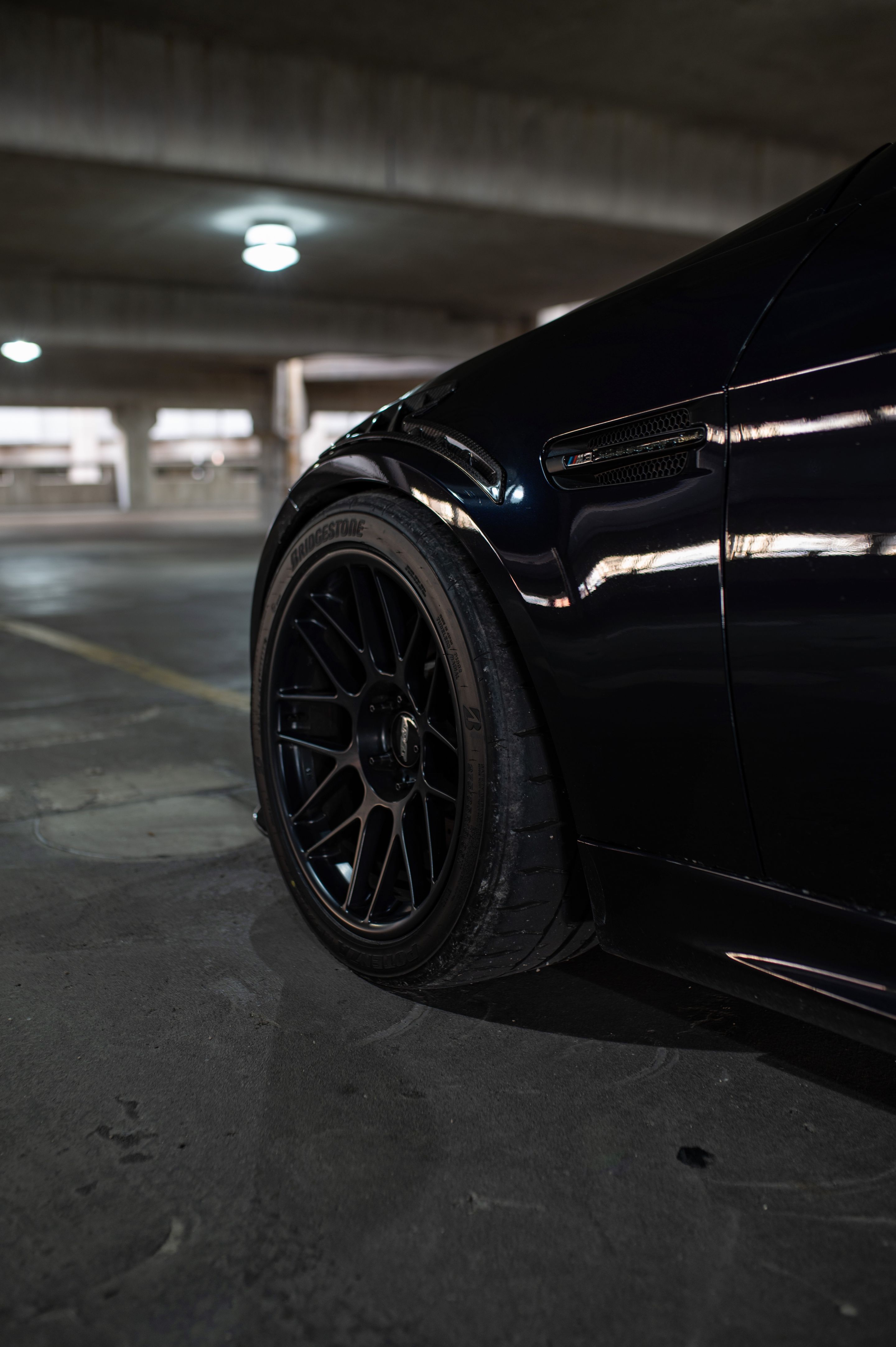 Black BMW E90 Sedan M3 with 18" ARC-8 Apex wheels in Satin Black