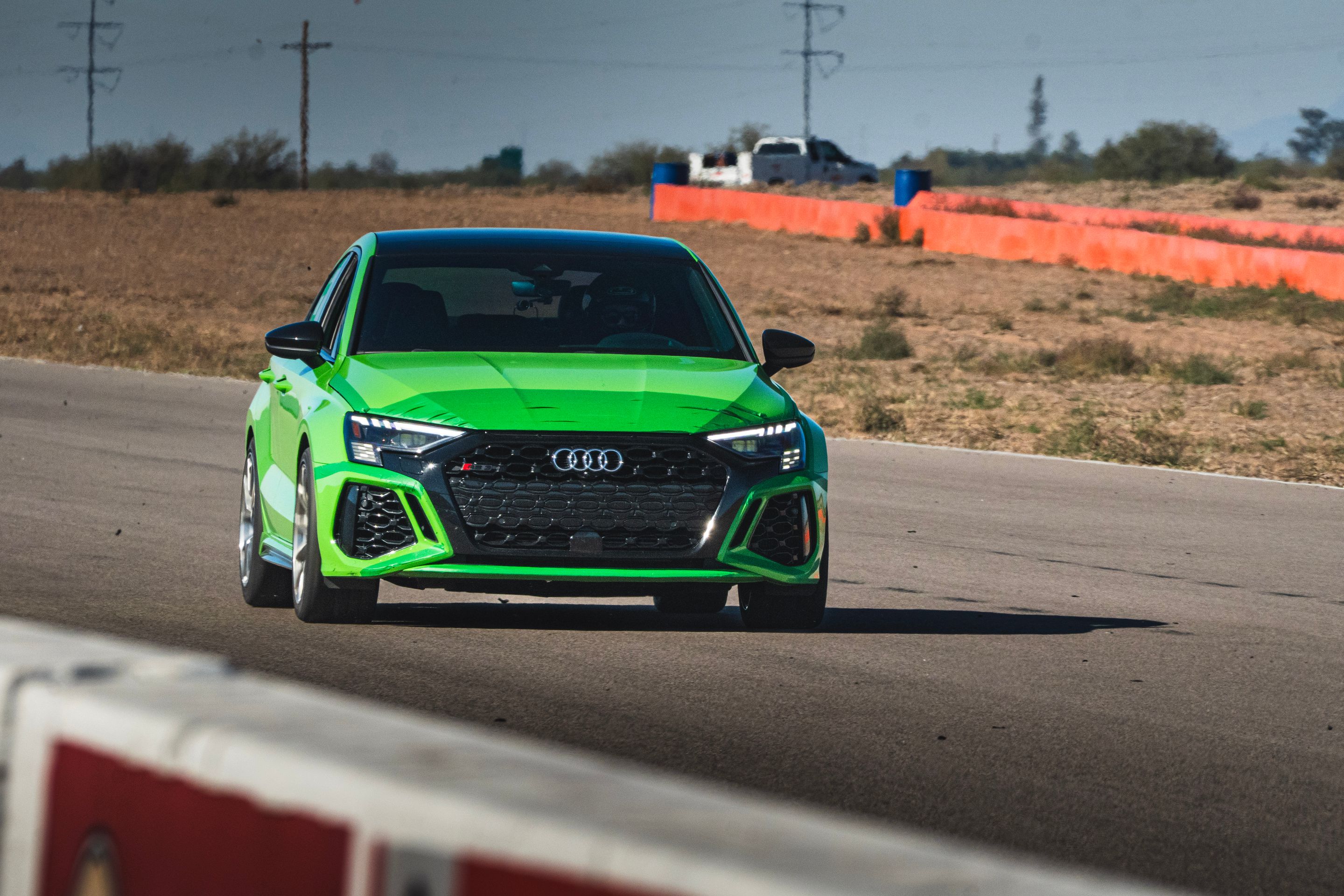 Green Audi 8Y RS 3 with 18" VS-5RS Apex wheels in Brushed Clear