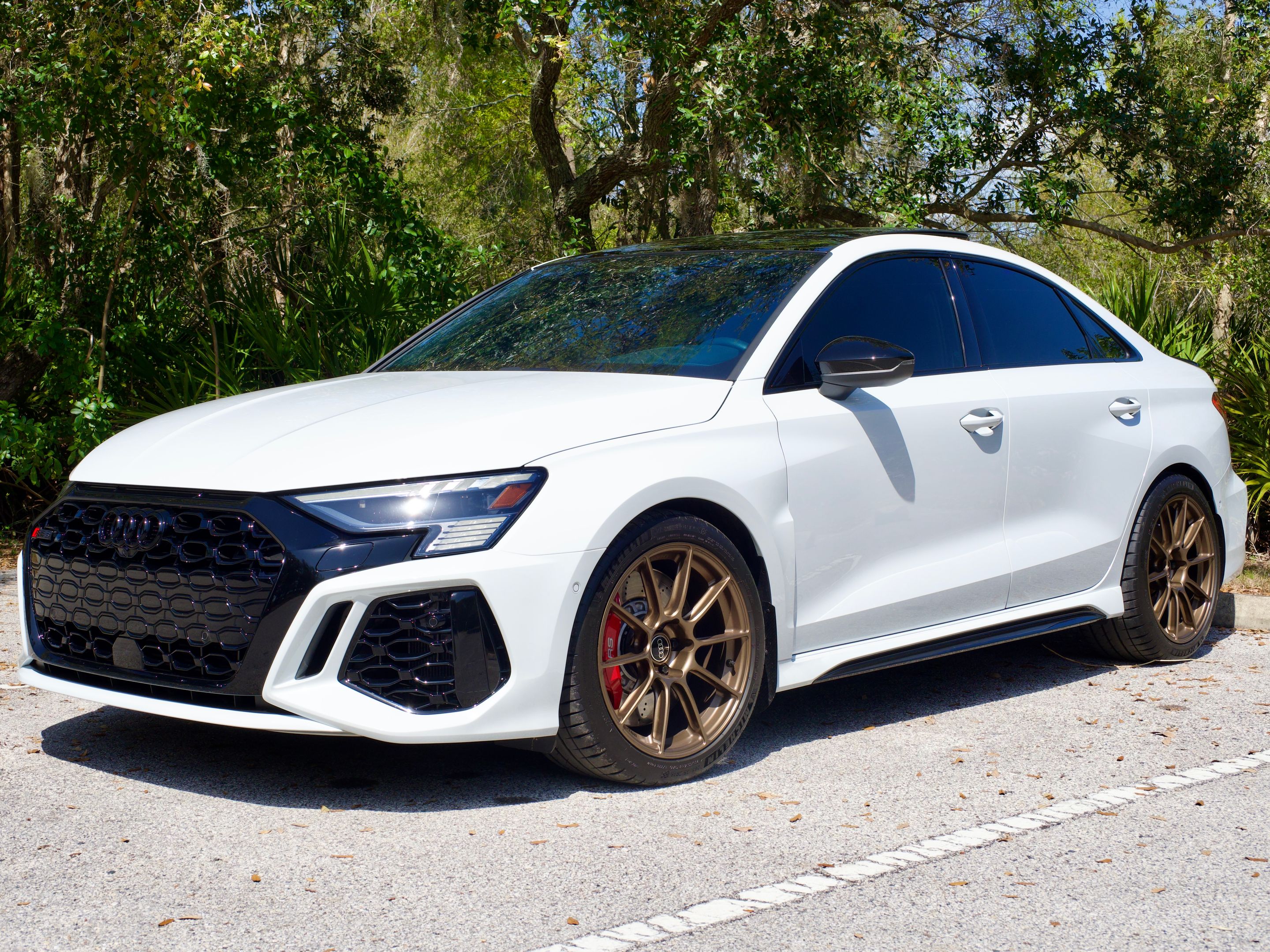 White Audi 8Y RS 3 with 18" SM-10RS Apex wheels in Satin Bronze