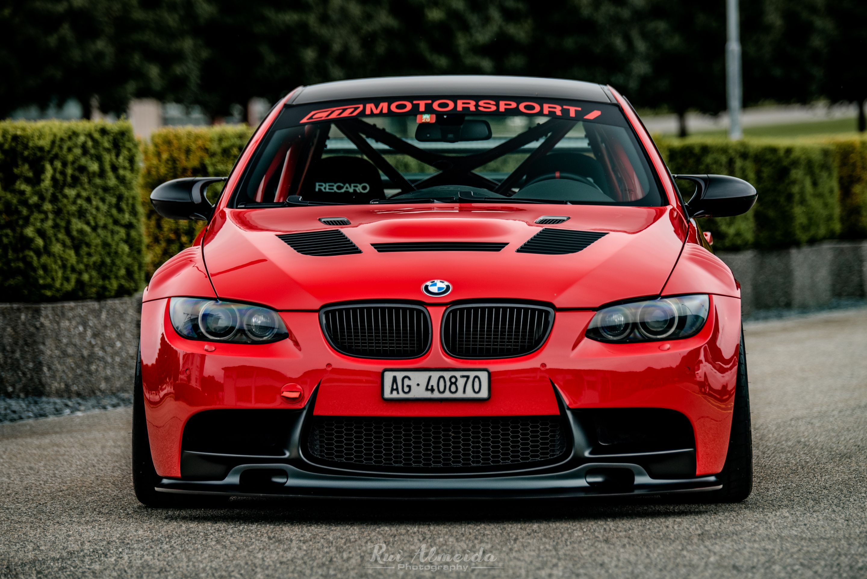 Red BMW E92 Coupe M3 with 18" EC-7R Apex wheels in Satin Black