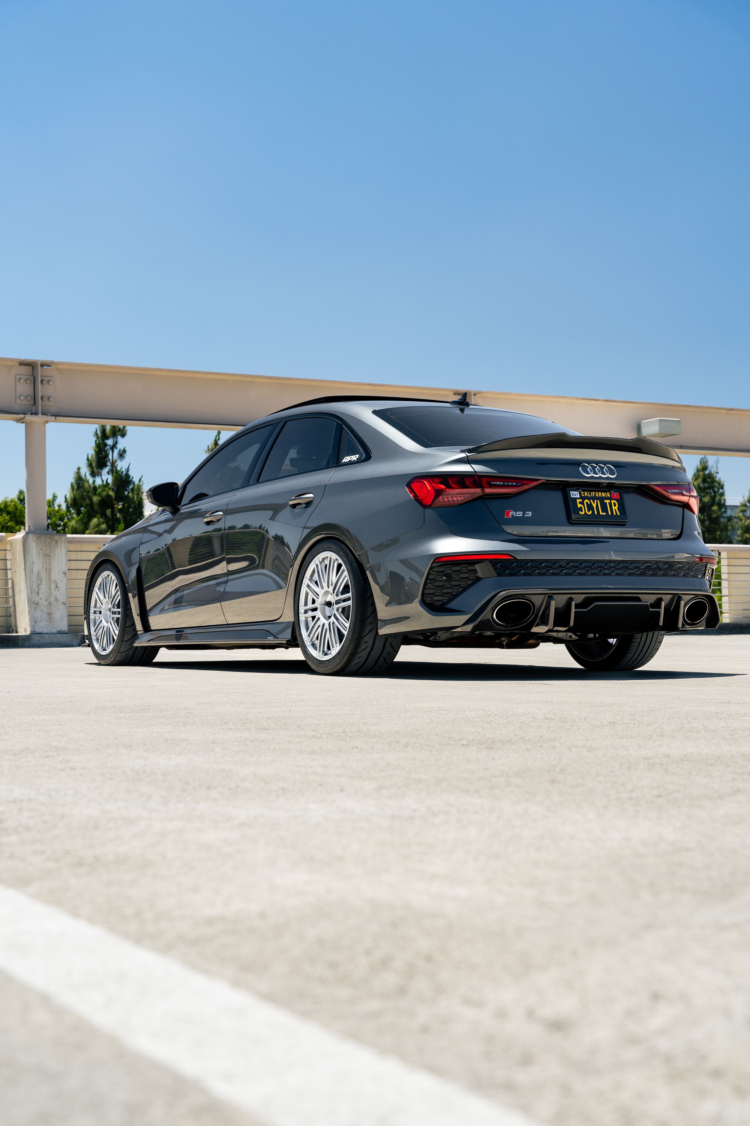 Grey Audi 8Y RS 3 with 18" TC-10RT Apex wheels in Race Silver
