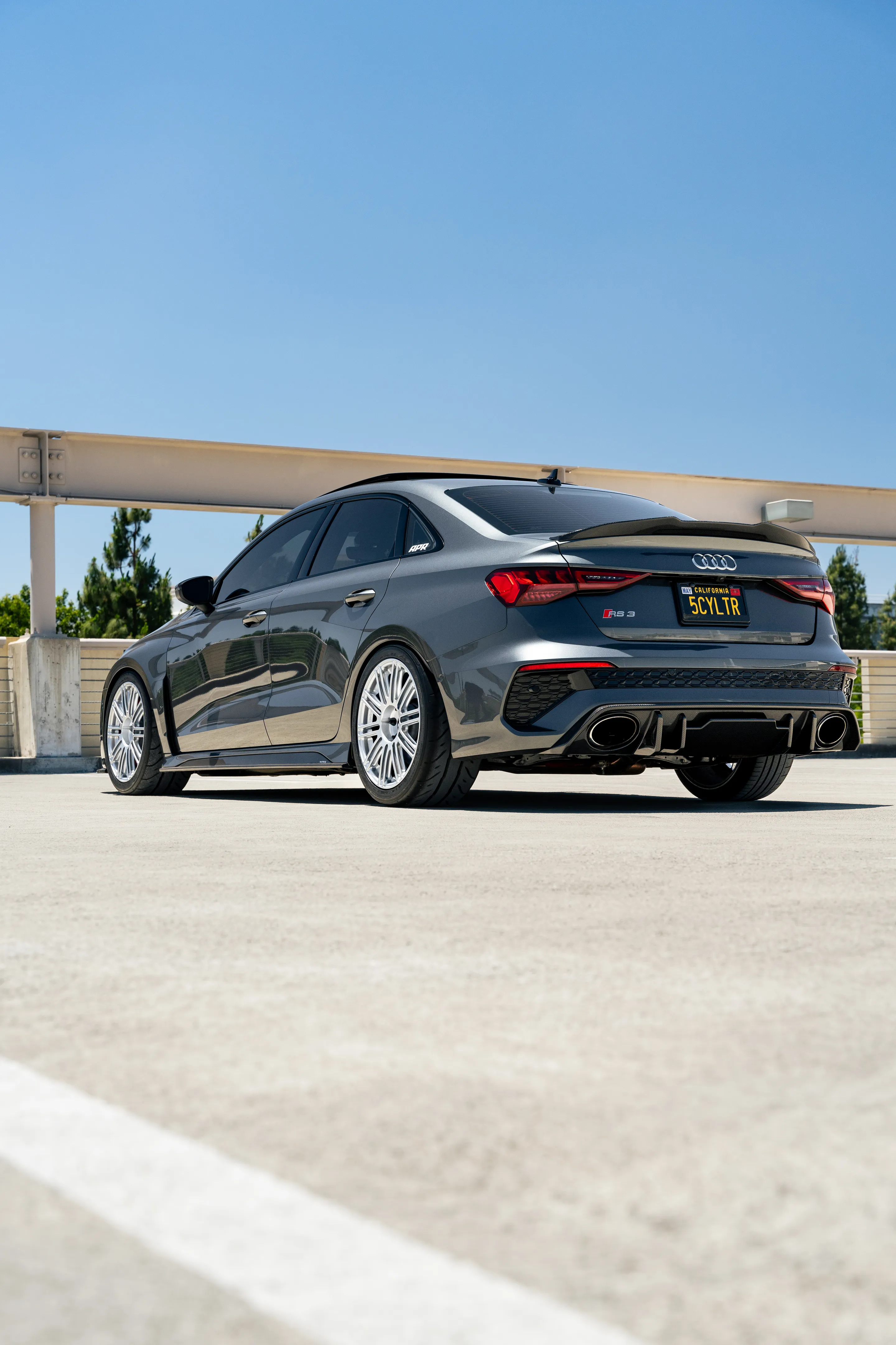 Grey Audi 8Y RS 3 with 18" TC-10RT Apex wheels in Race Silver