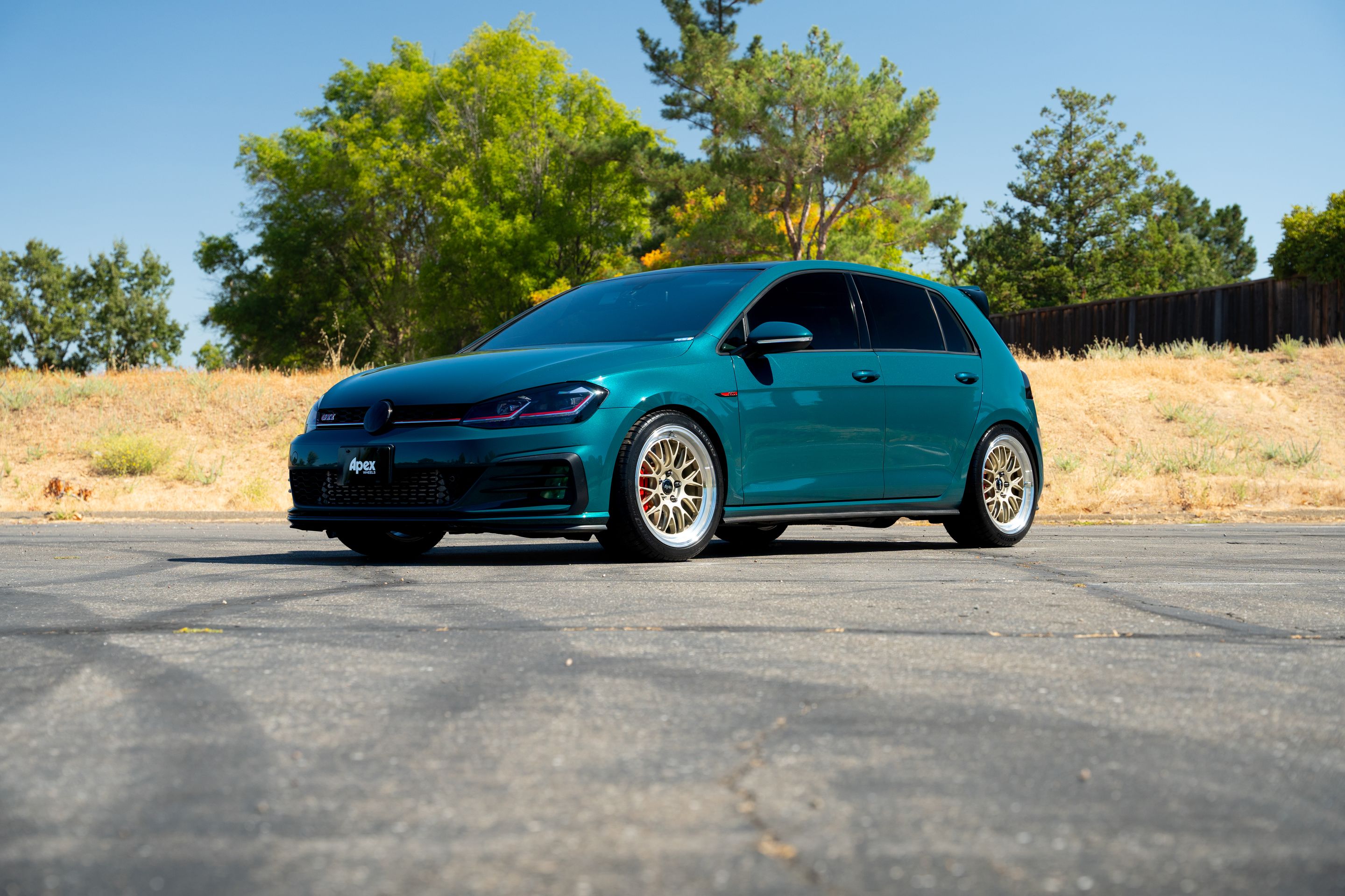 Green VW MK7 GTI with 18" ML-10RT Apex wheels in Machined Lip Gloss Motorsport Gold