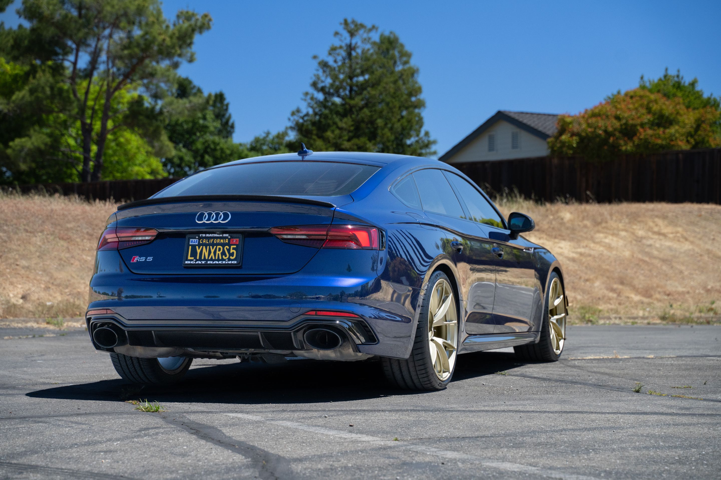 Blue Audi B9 RS 5 Sportback with 20" VS-5RS Apex wheels in Motorsport Gold