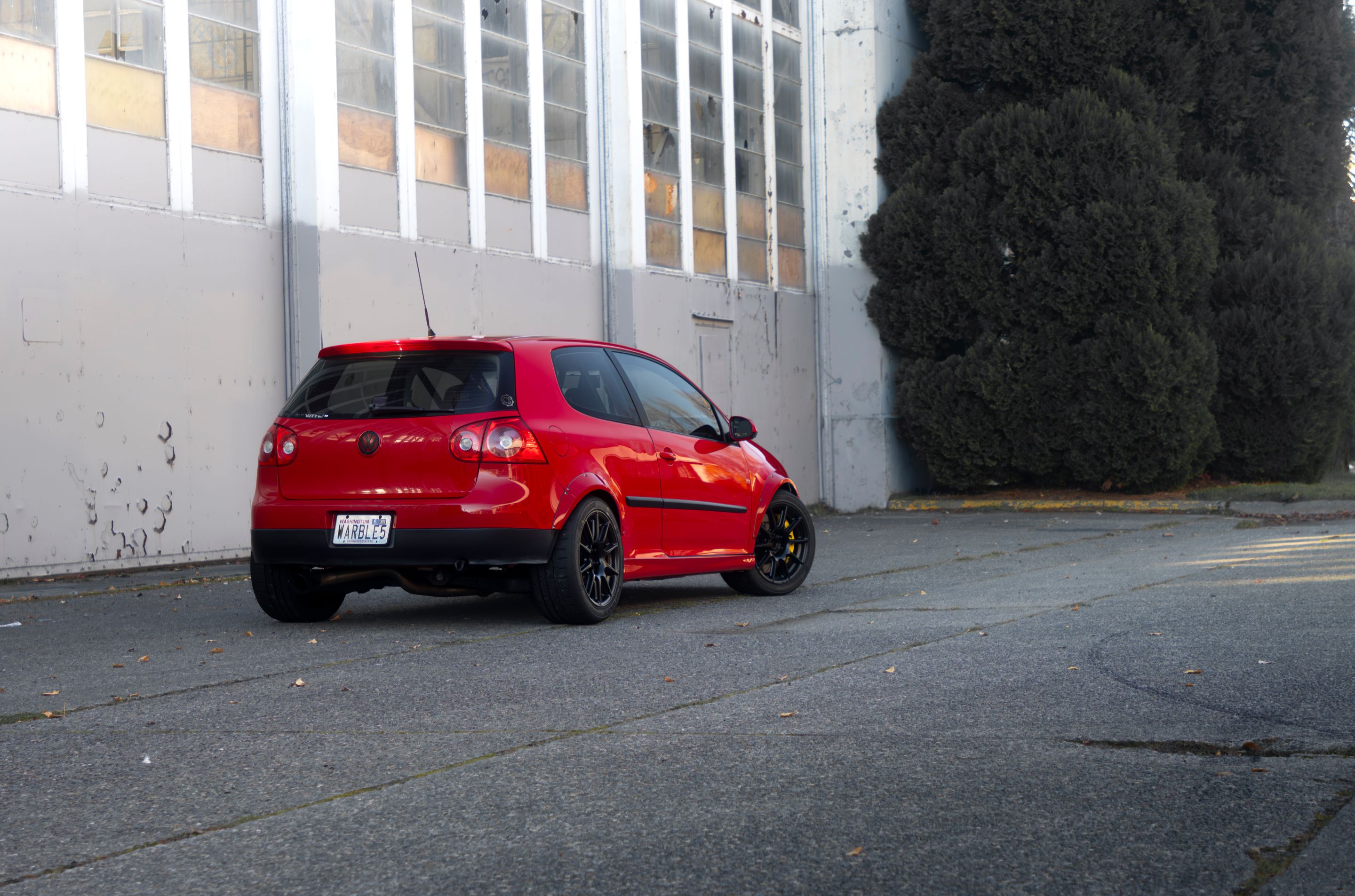 Red VW MK5 Golf with 17" SM-10 Apex wheels in Satin Black