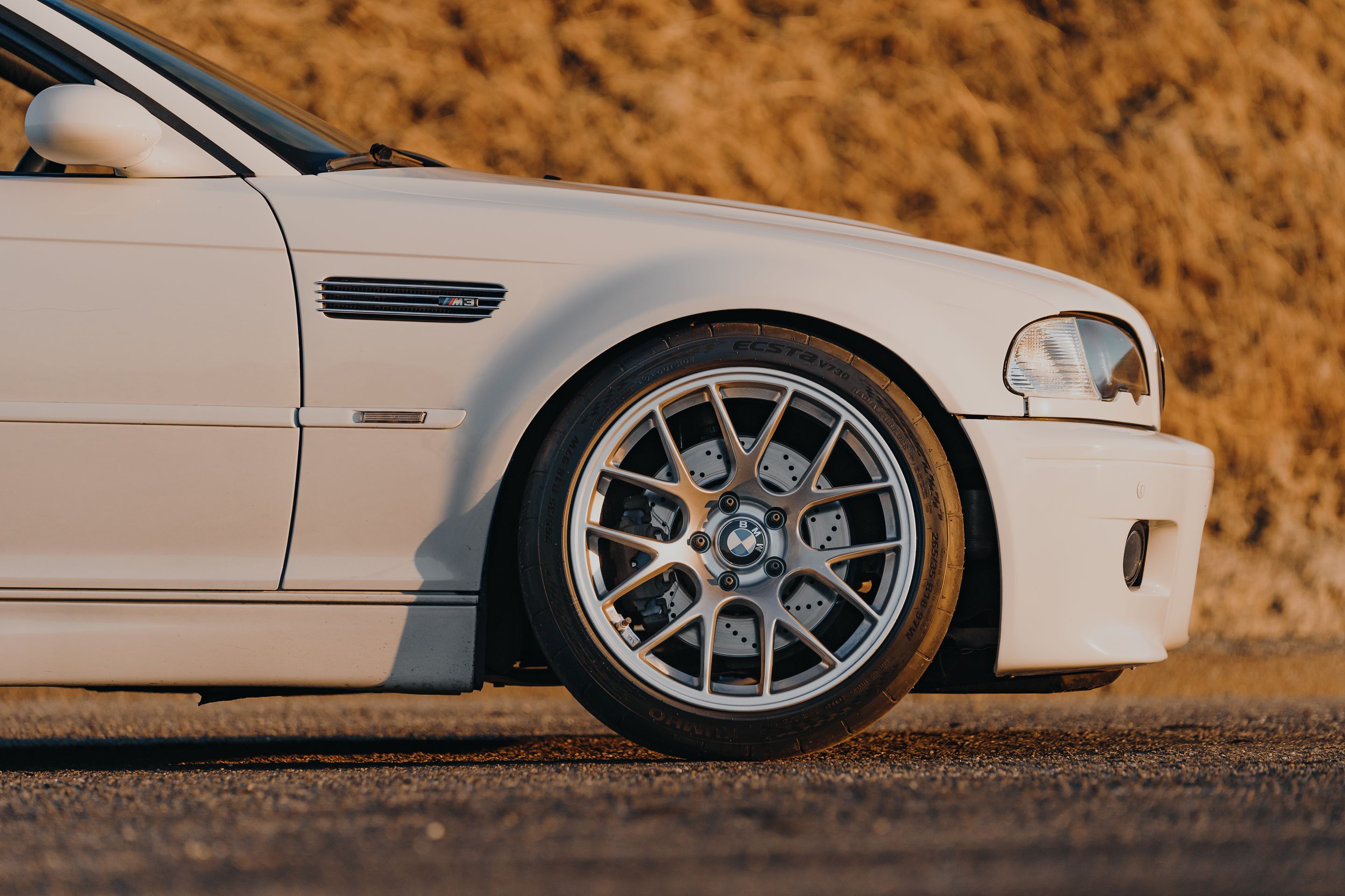 White BMW E46 M3 with 18" EC-7 Apex wheels in Race Silver