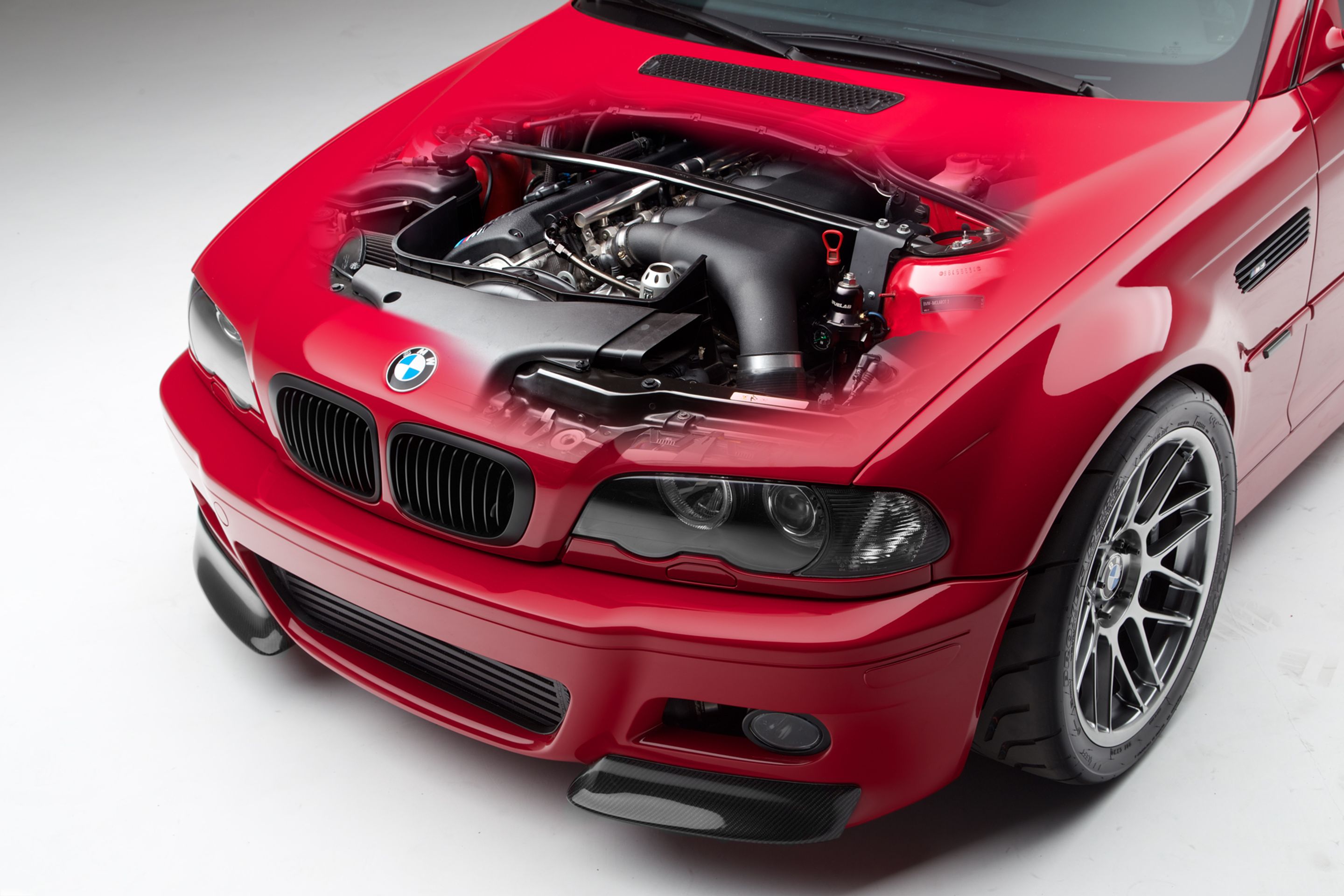 Red BMW E46 M3 with 18" ARC-8 Apex wheels in Hyper Black