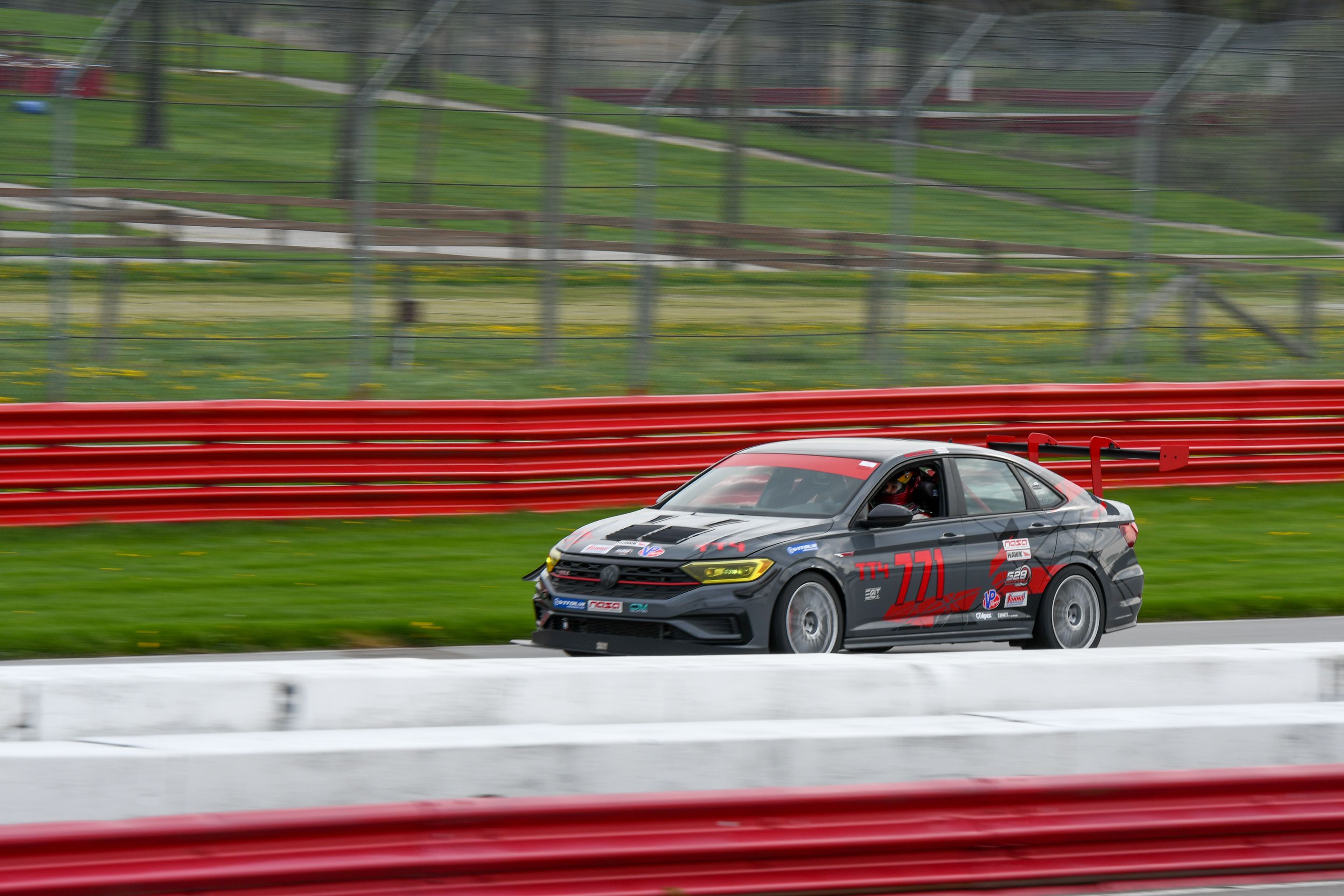 Race Livery VW MK7 GLI with 18" TC-10RT Apex wheels in Race Silver