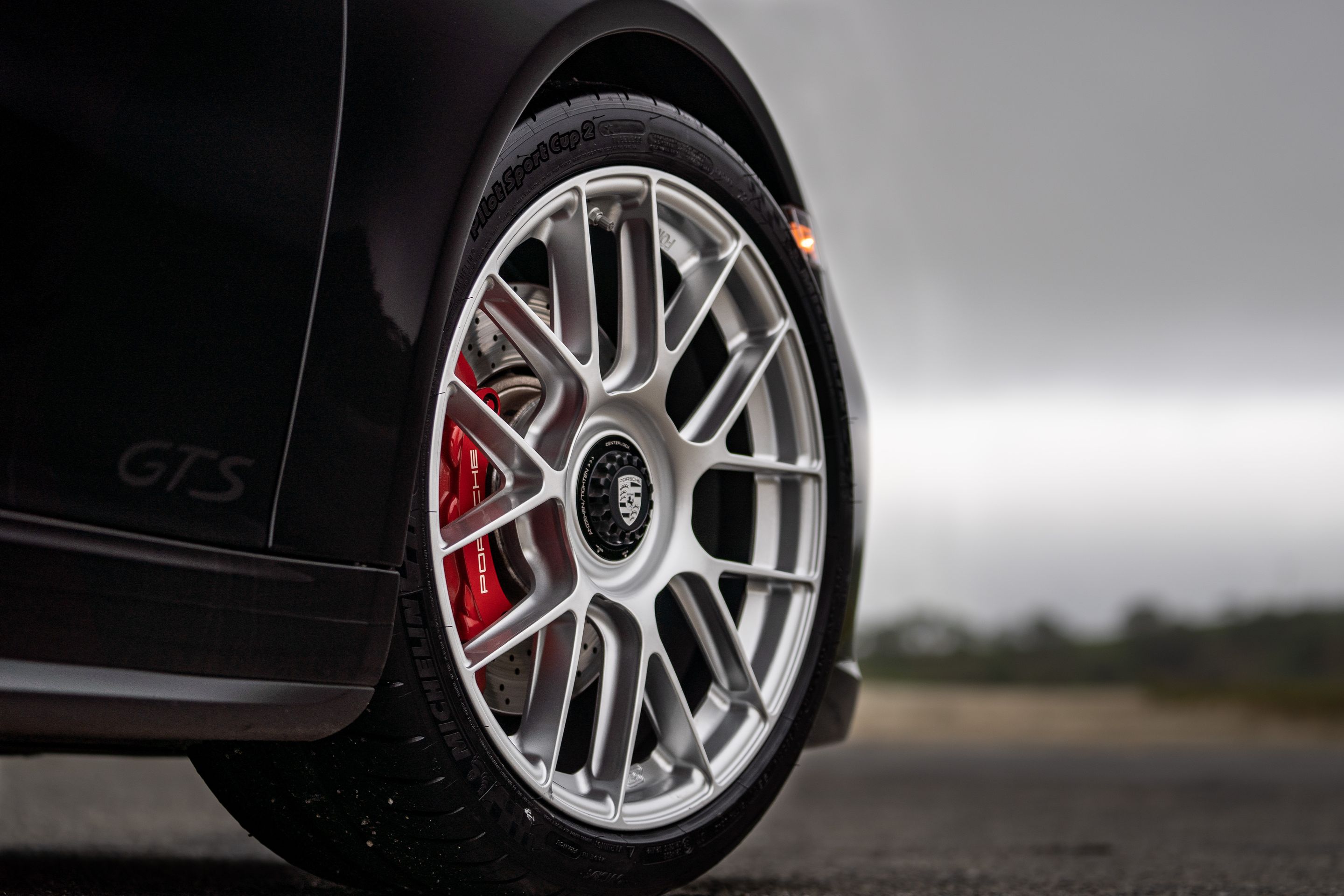 Black Porsche 911 991.2 Carrera GTS with 19" EC-7RS Apex wheels in Race Silver