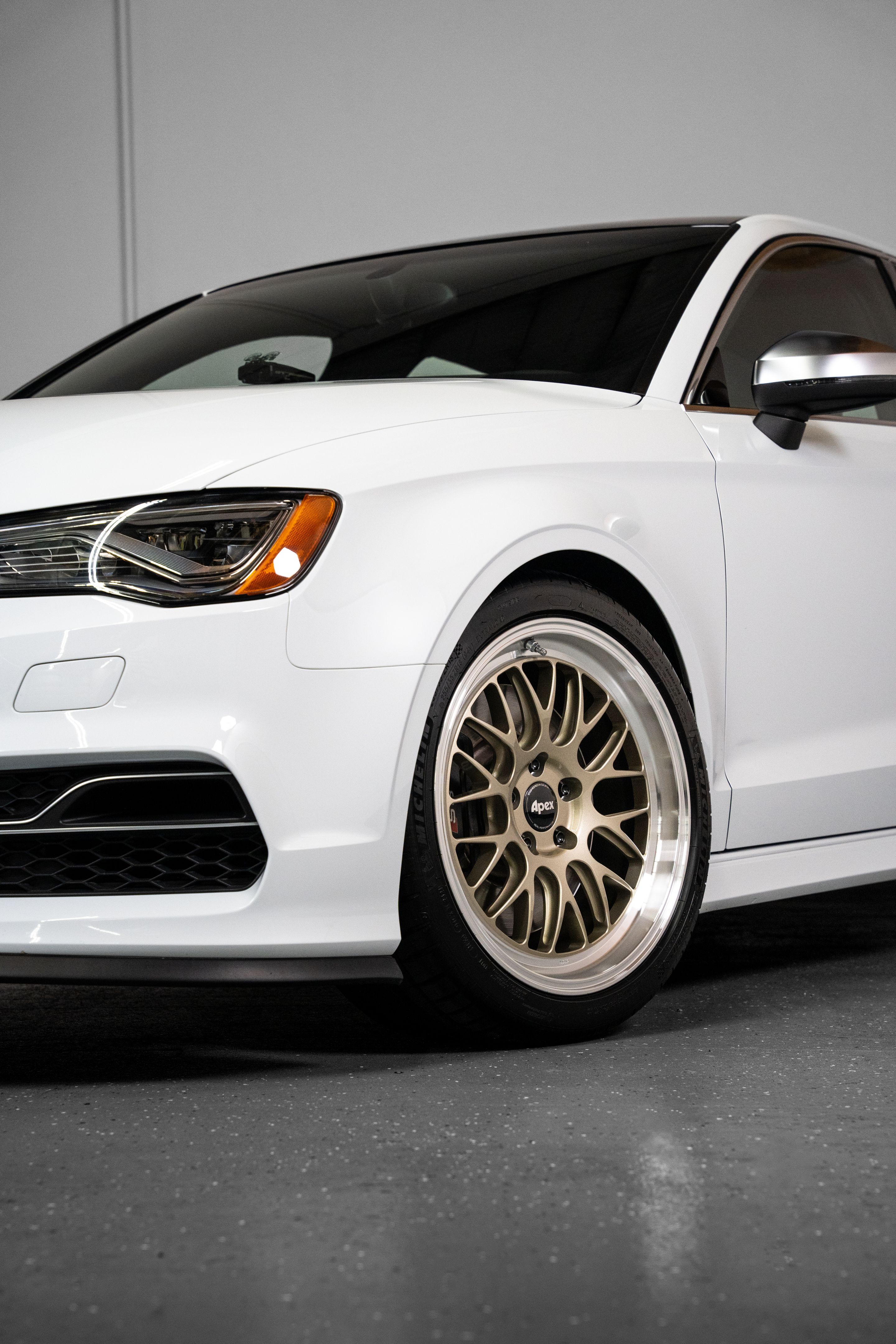 White Audi 8V S3 with 18" ML-10RT Apex wheels in Machined Lip Gloss Motorsport Gold