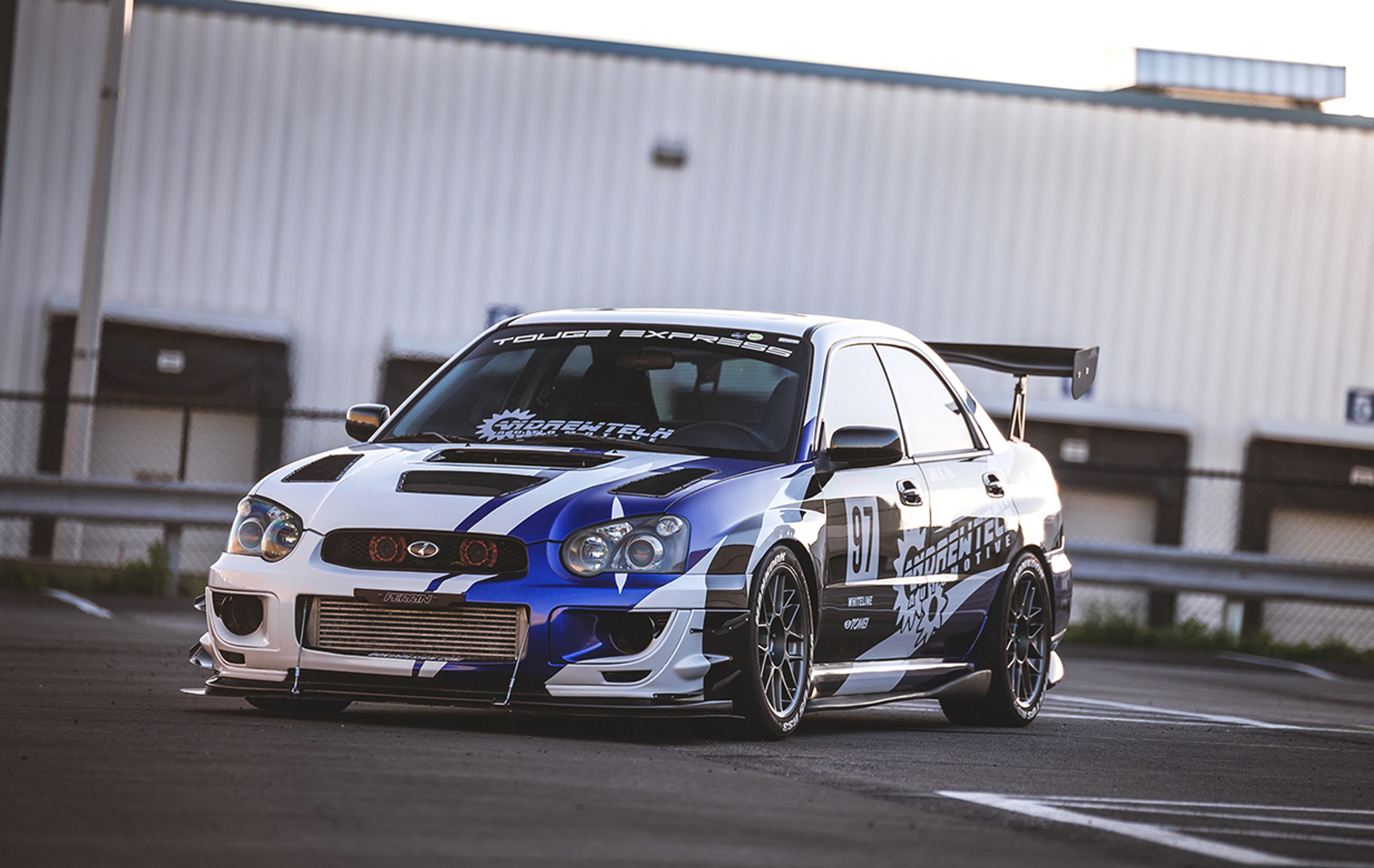 Black Subaru GD WRX Sedan with 17" ARC-8 Apex wheels in Anthracite