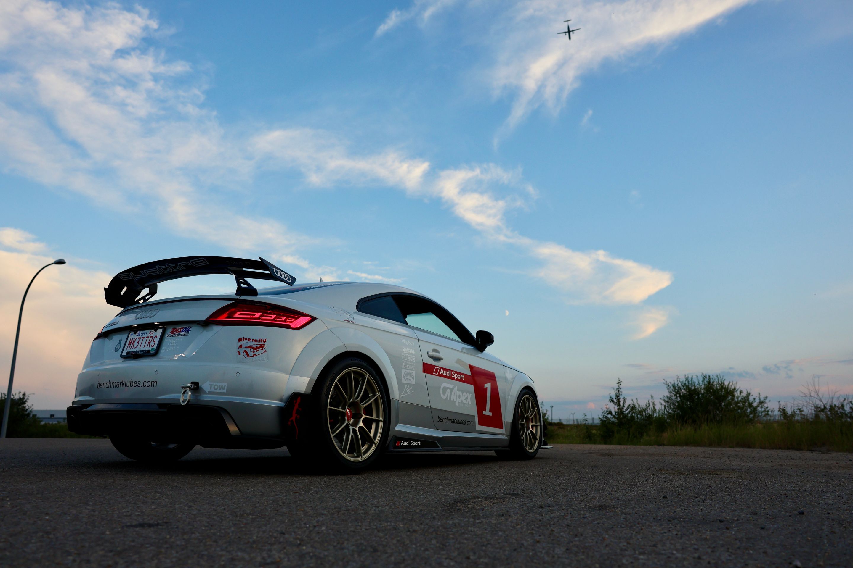 White Audi FV/8S TT RS with 18" SM-10RS Apex wheels in Motorsport Gold
