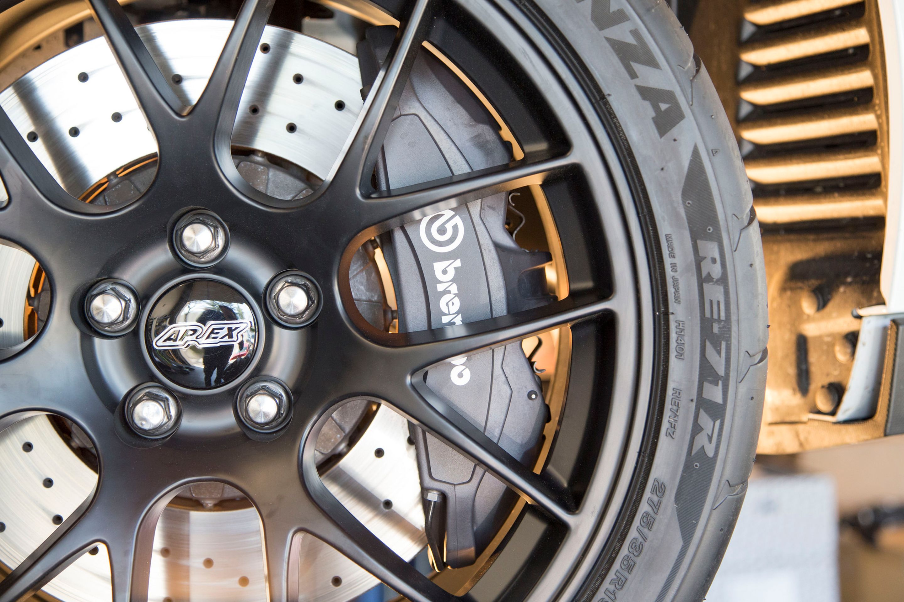 Blue Porsche 986 Boxster with 20" EC-7RS Apex wheels in Satin Black