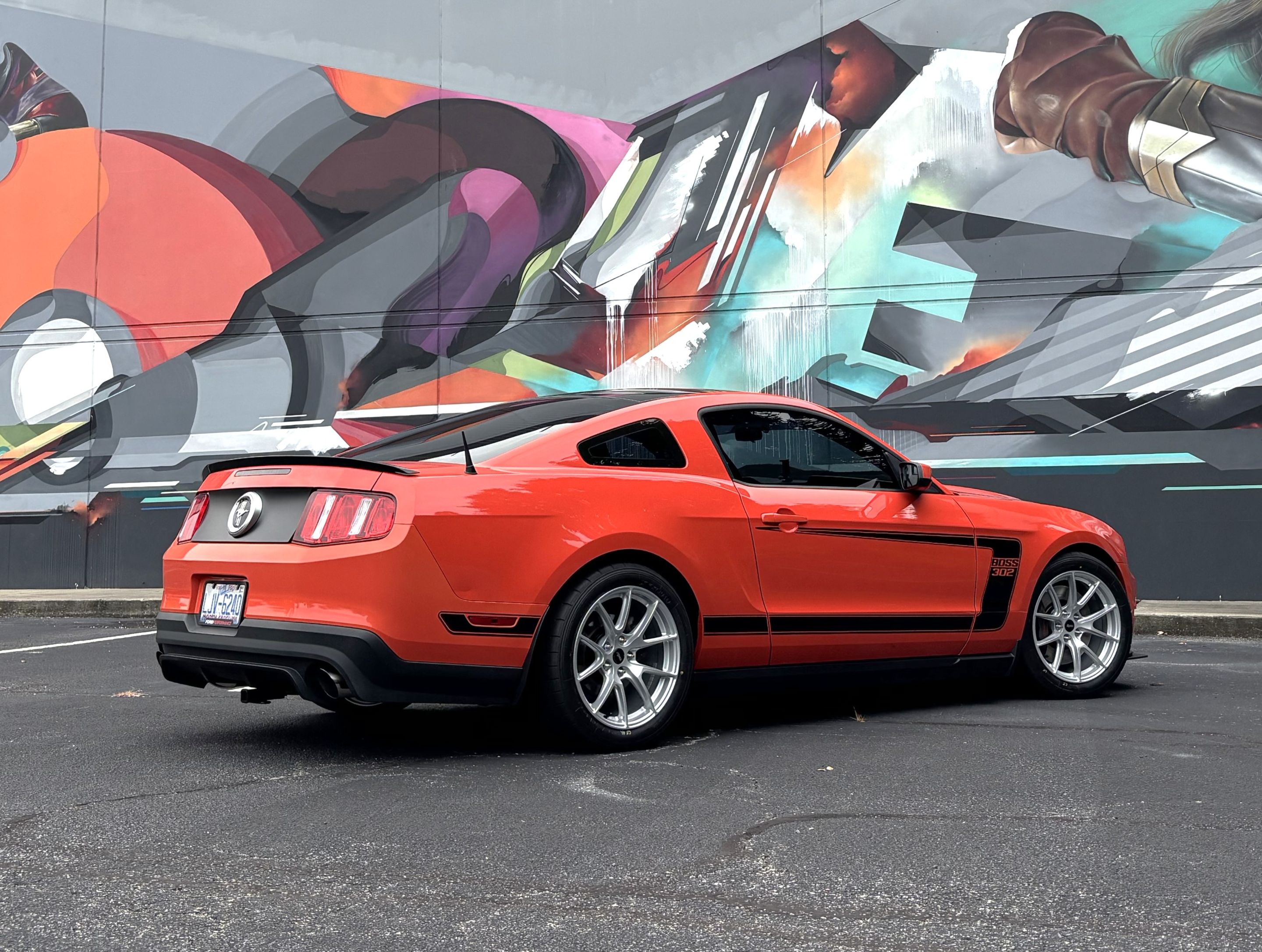 Red Ford S197 Mustang Boss 302 with 18" VS-5 Apex wheels in Race Silver