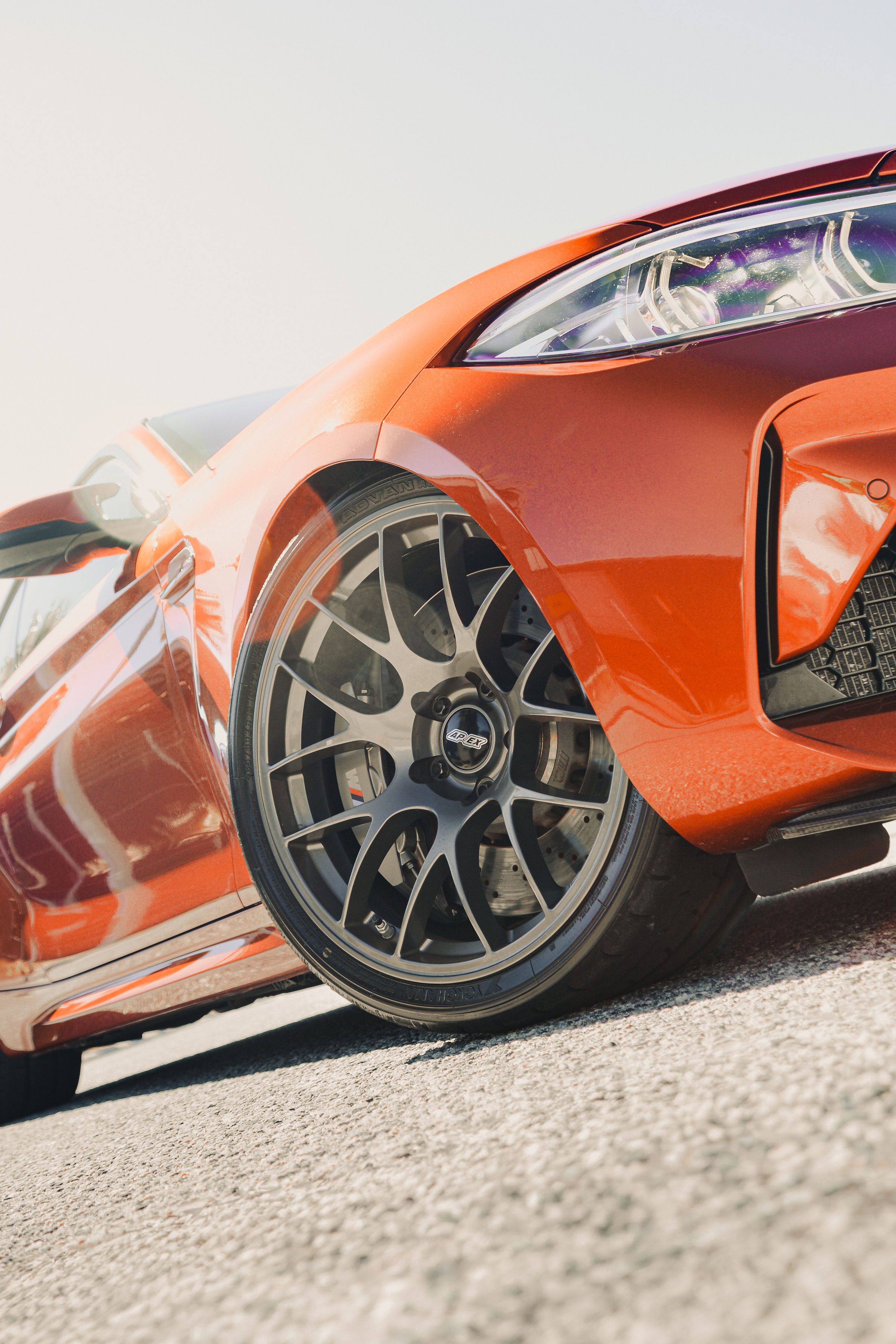 Orange BMW F87 M2 with 19" EC-7 Apex wheels in Anthracite