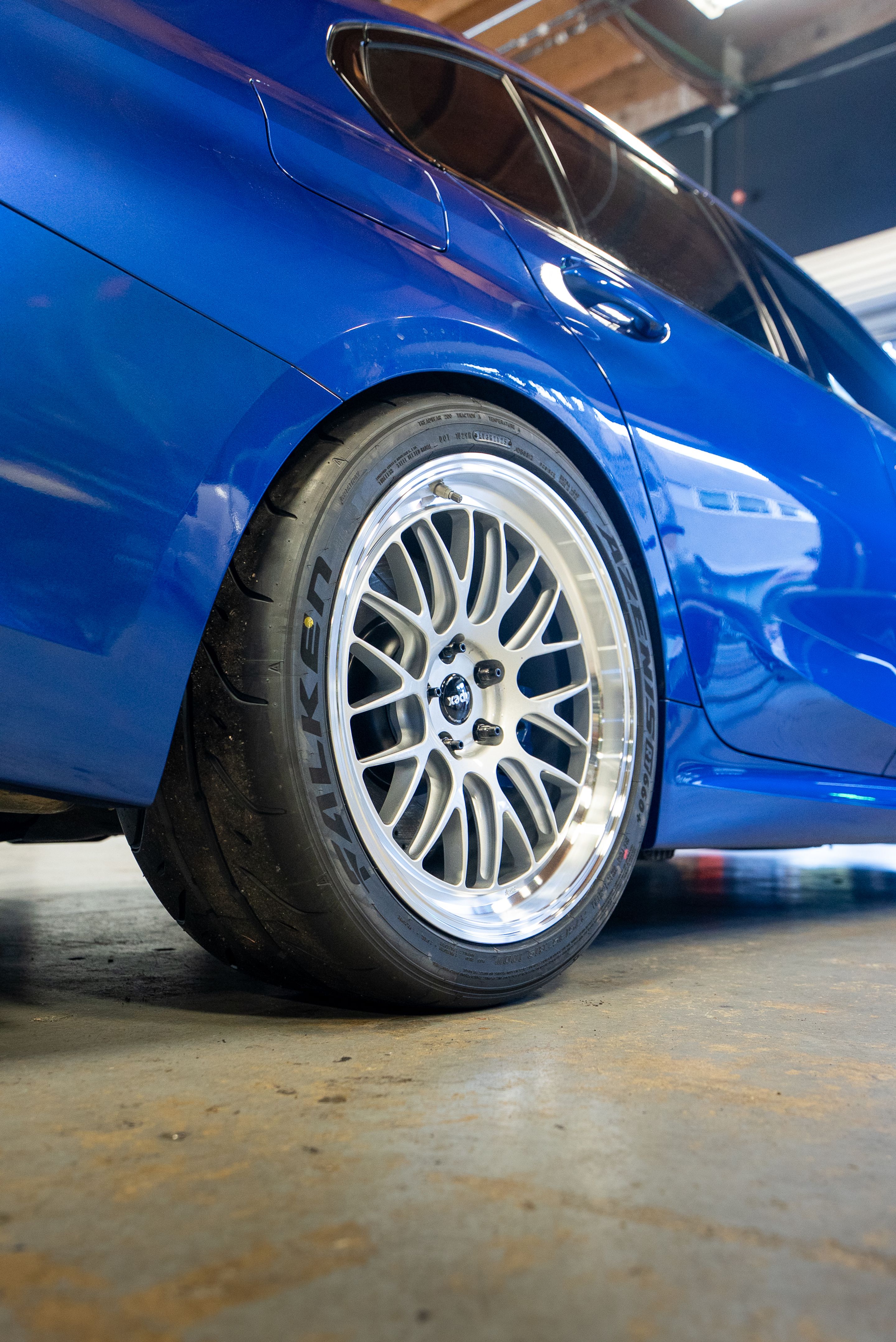 Blue BMW G20 Sedan 3 Series with 19" ML-10RT Apex wheels in Machined Lip Race Silver