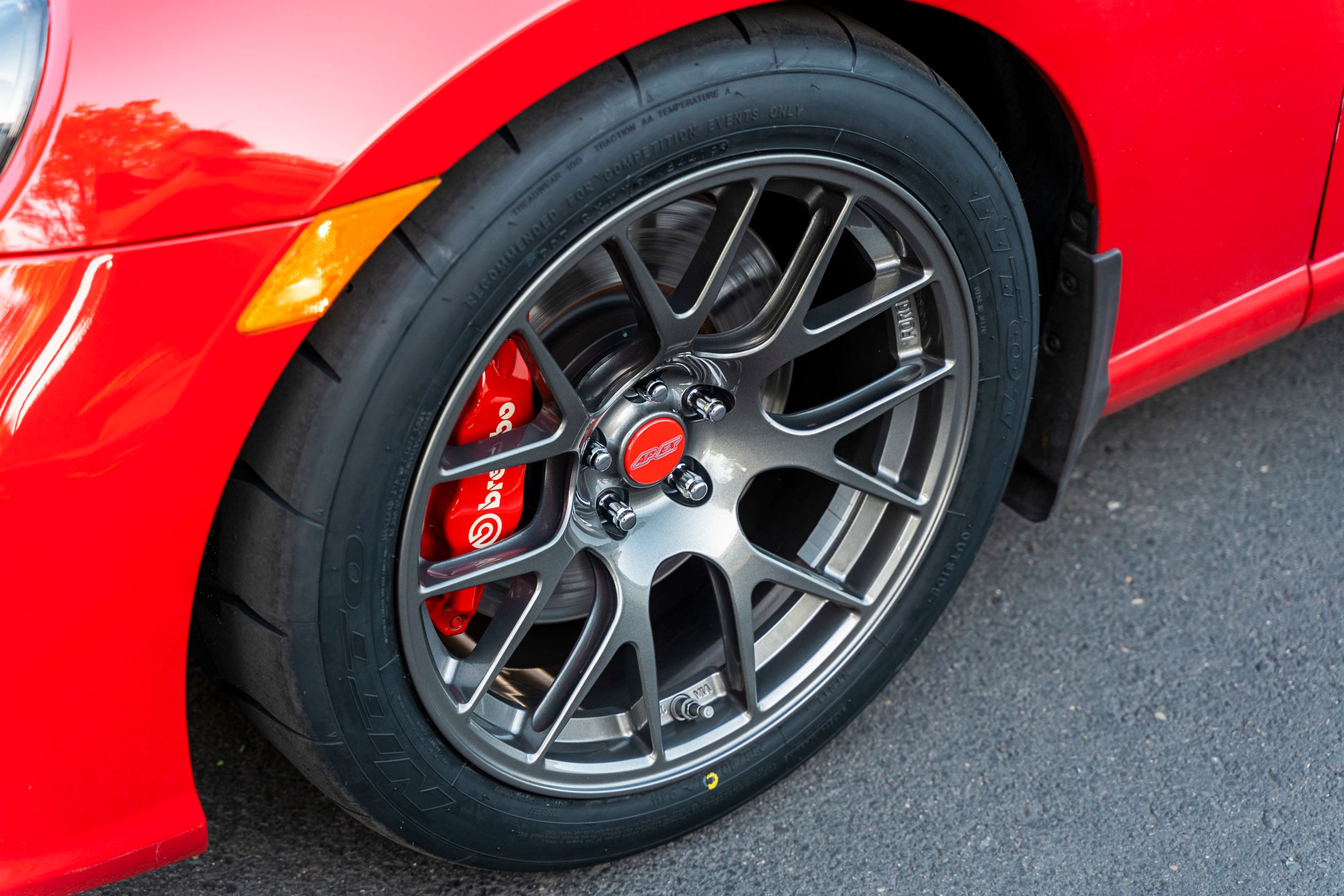Red Subaru ZC6 / Gen 1 BRZ with 17" EC-7R Apex wheels in Anthracite