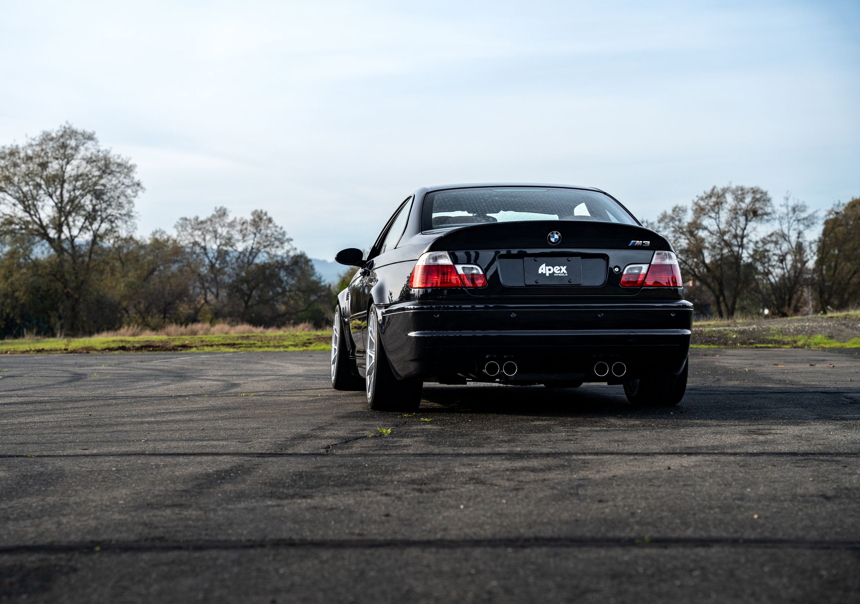 Black BMW E46 M3 with 18" VS-5 Apex wheels in Race Silver