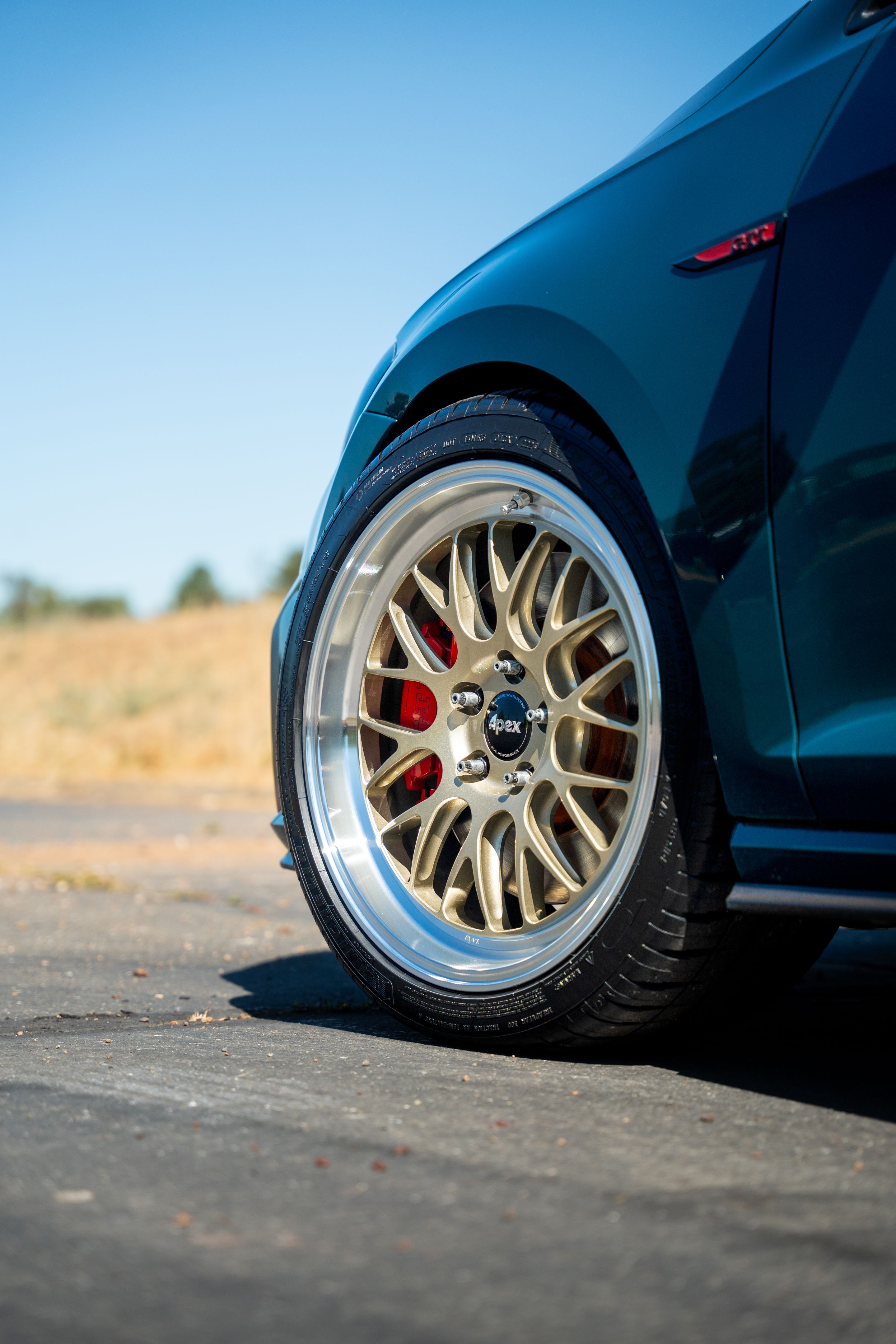 Green VW MK7 GTI with 18" ML-10RT Apex wheels in Machined Lip Gloss Motorsport Gold