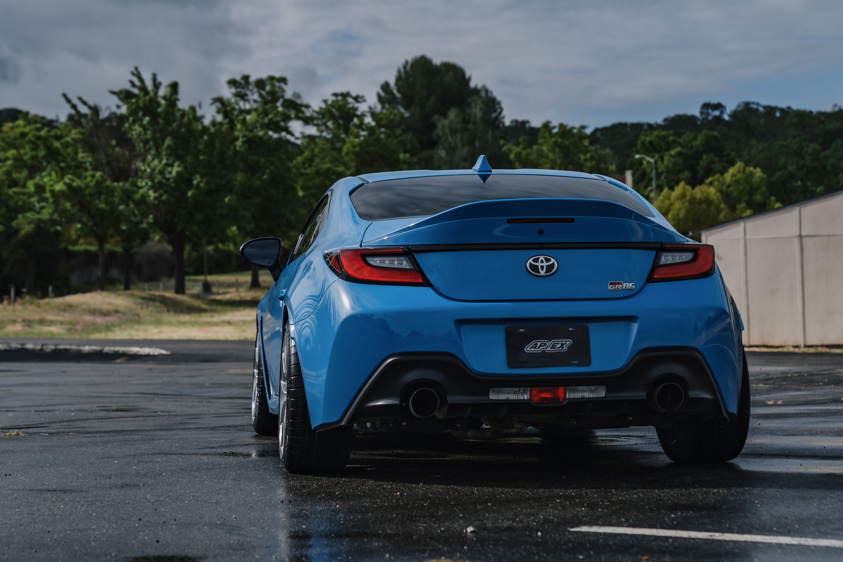 Blue Toyota GR86 with 18" VS-5RS Apex wheels in Brushed Clear