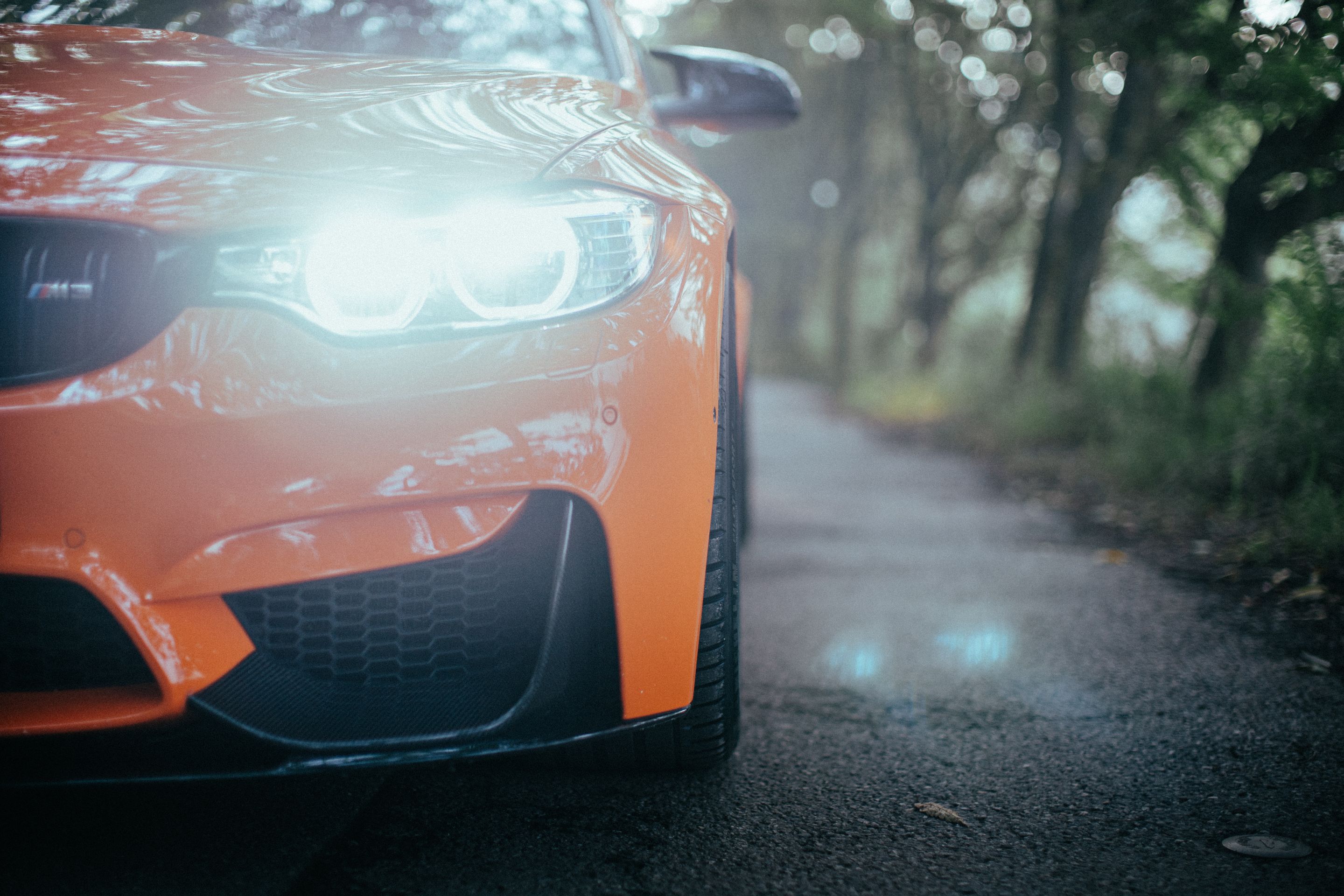 Orange BMW F80 M3 with 18" EC-7 Apex wheels in Satin Black